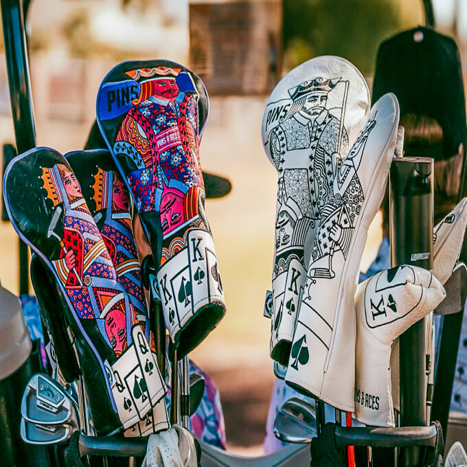 Colorful, bold golf headcovers featuring playing card and king designs for golfers who stand out on the course.