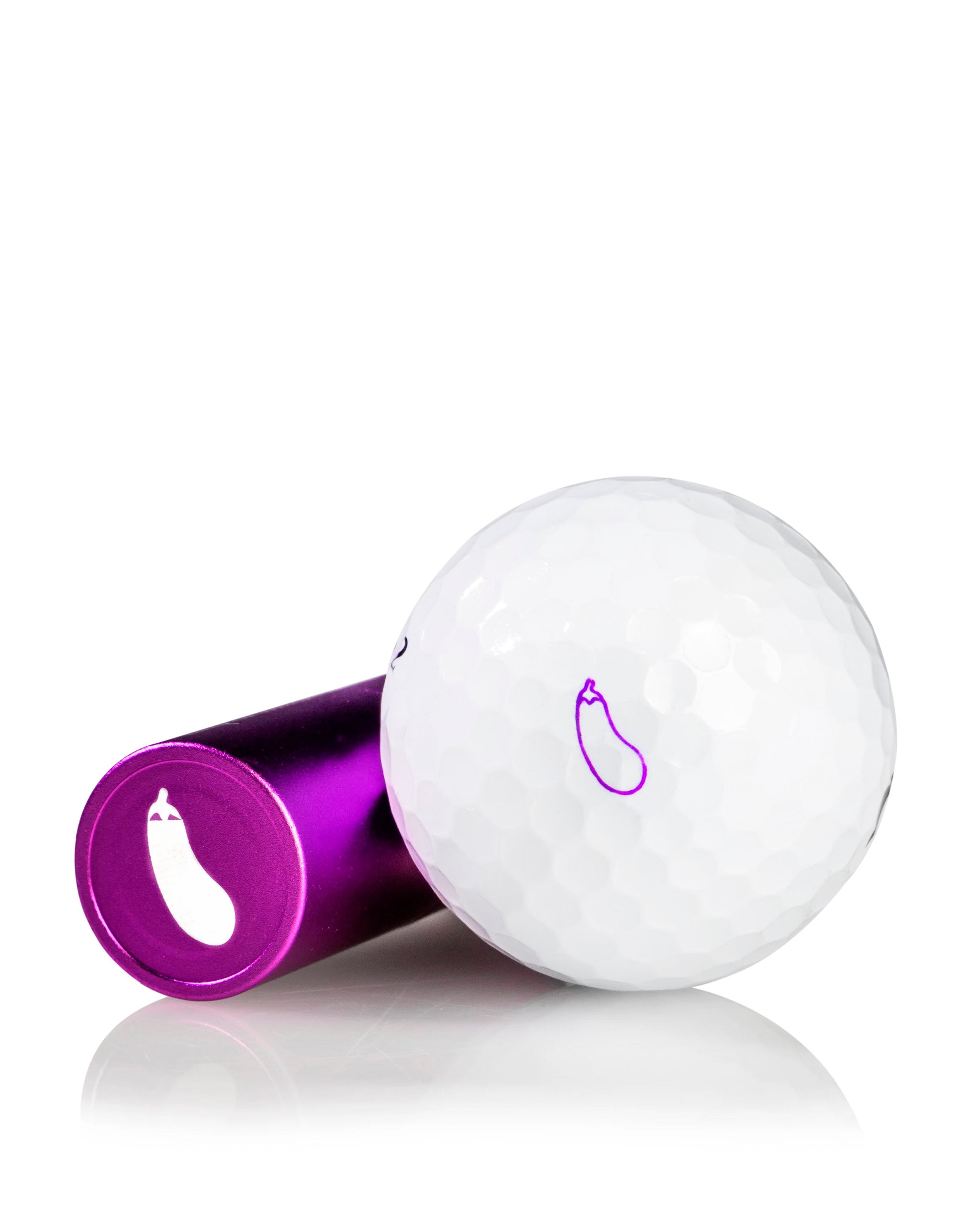 Eggplant ball stamp with a purple design, resting beside a white golf ball, perfect for adding personality to your game.