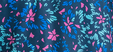 Fluorescent floral pattern featuring vibrant blue, pink, and teal leaves on a dark background, perfect for bold golf apparel.