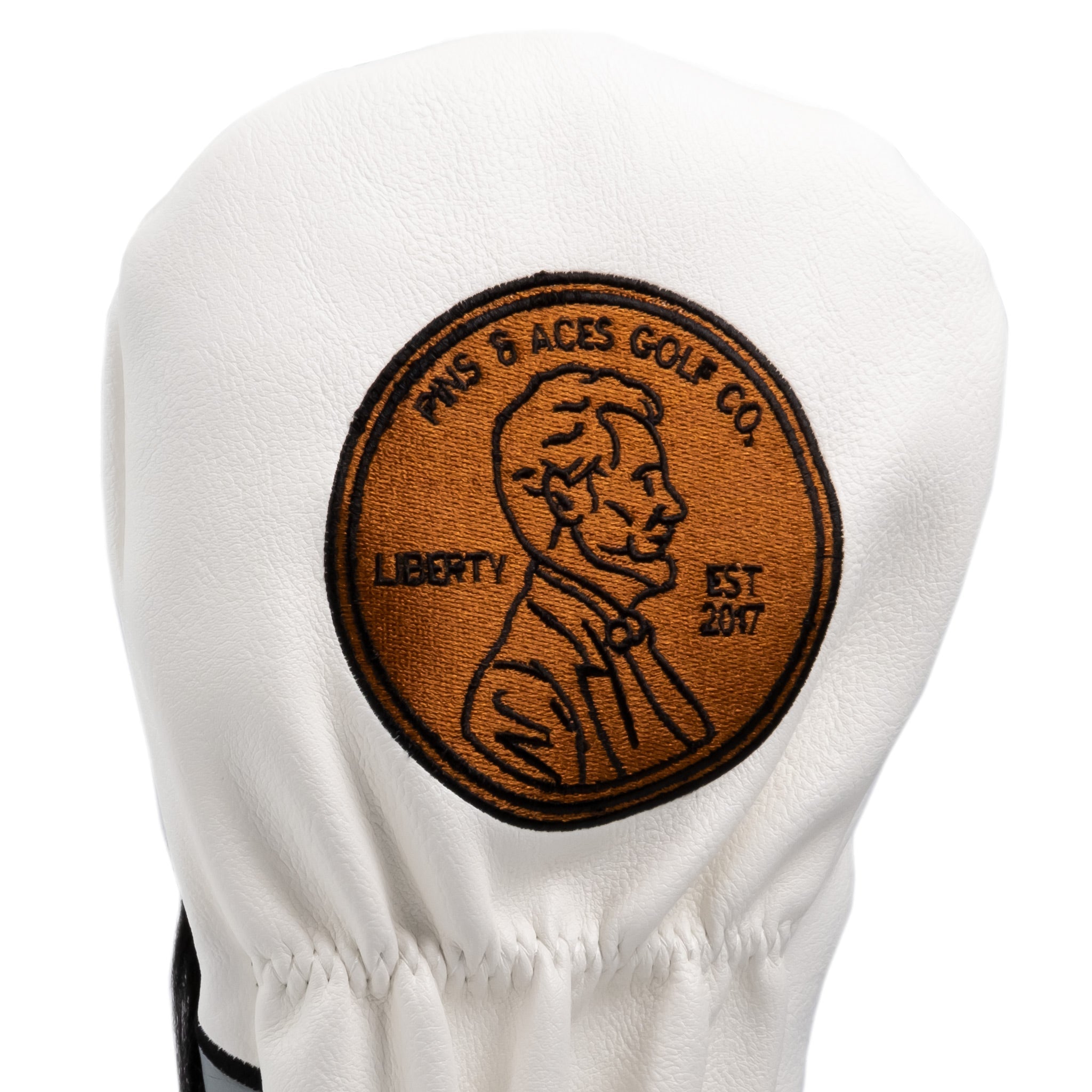 Abe Lincoln driver cover featuring a detailed embroidered design and a classic coin-inspired patch.