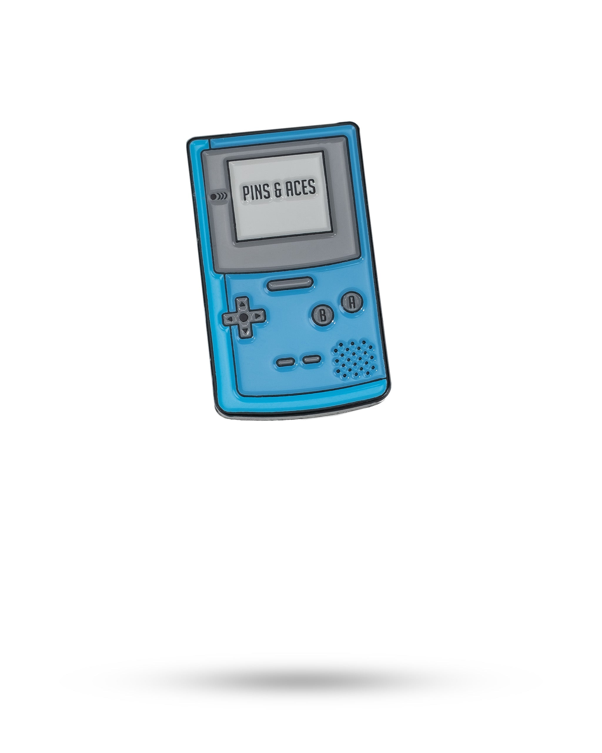 Game Boy ball marker featuring a retro design with vibrant colors, perfect for adding style to your golf game.