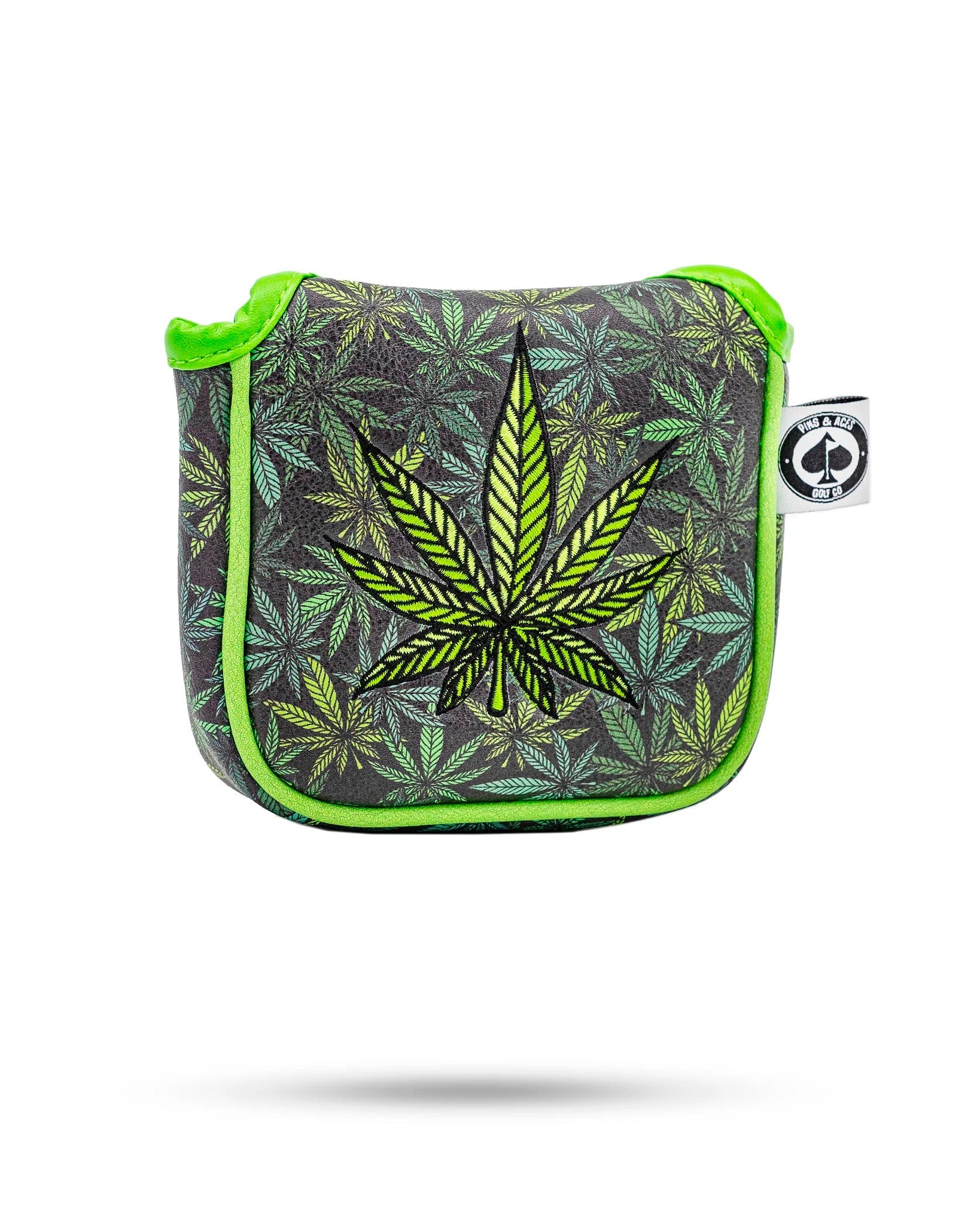 Bold mallet putter cover featuring a vibrant cannabis leaf design on a dark background with neon green accents.