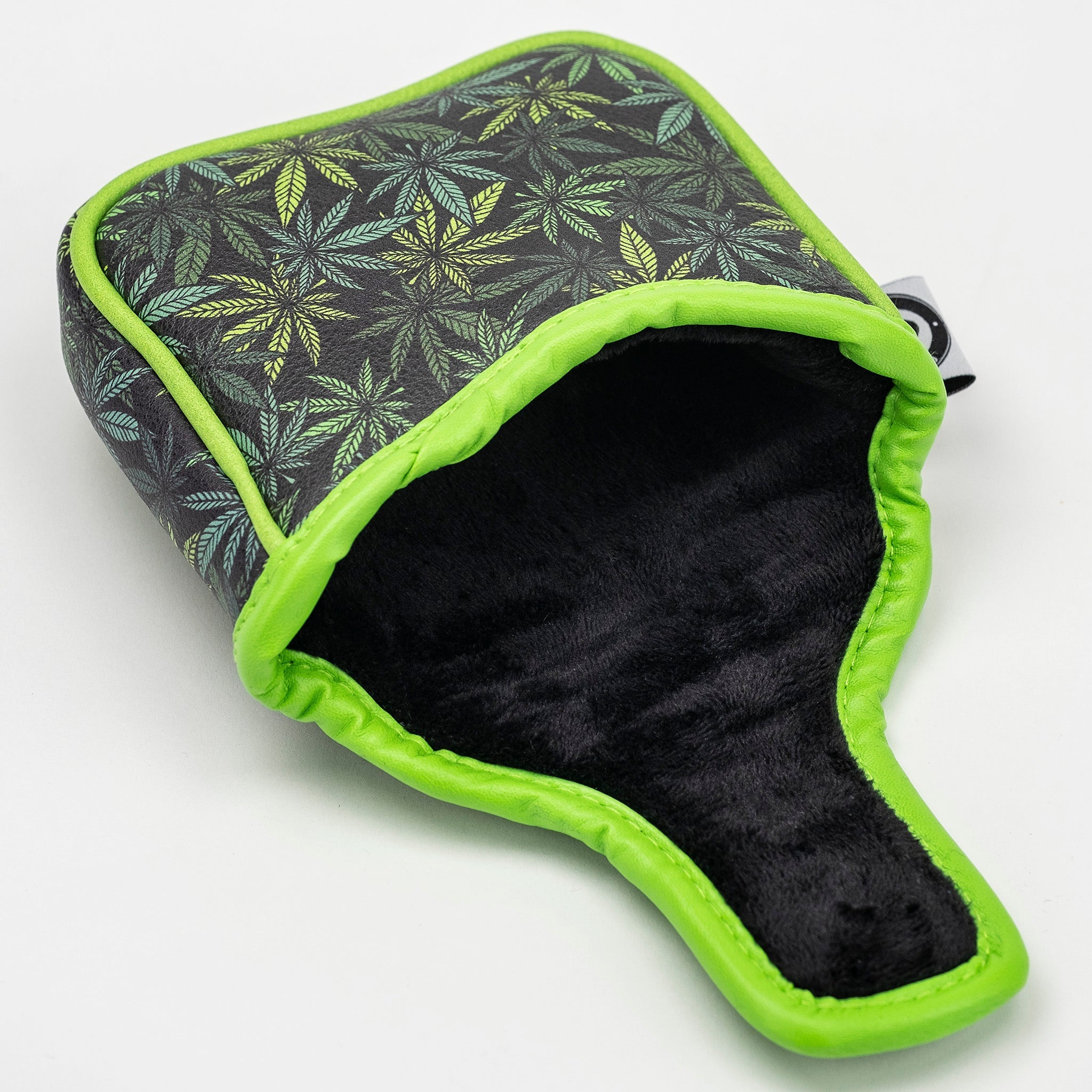 Bold mallet putter cover featuring a vibrant green and black leaf design, perfect for high handicap golfers.