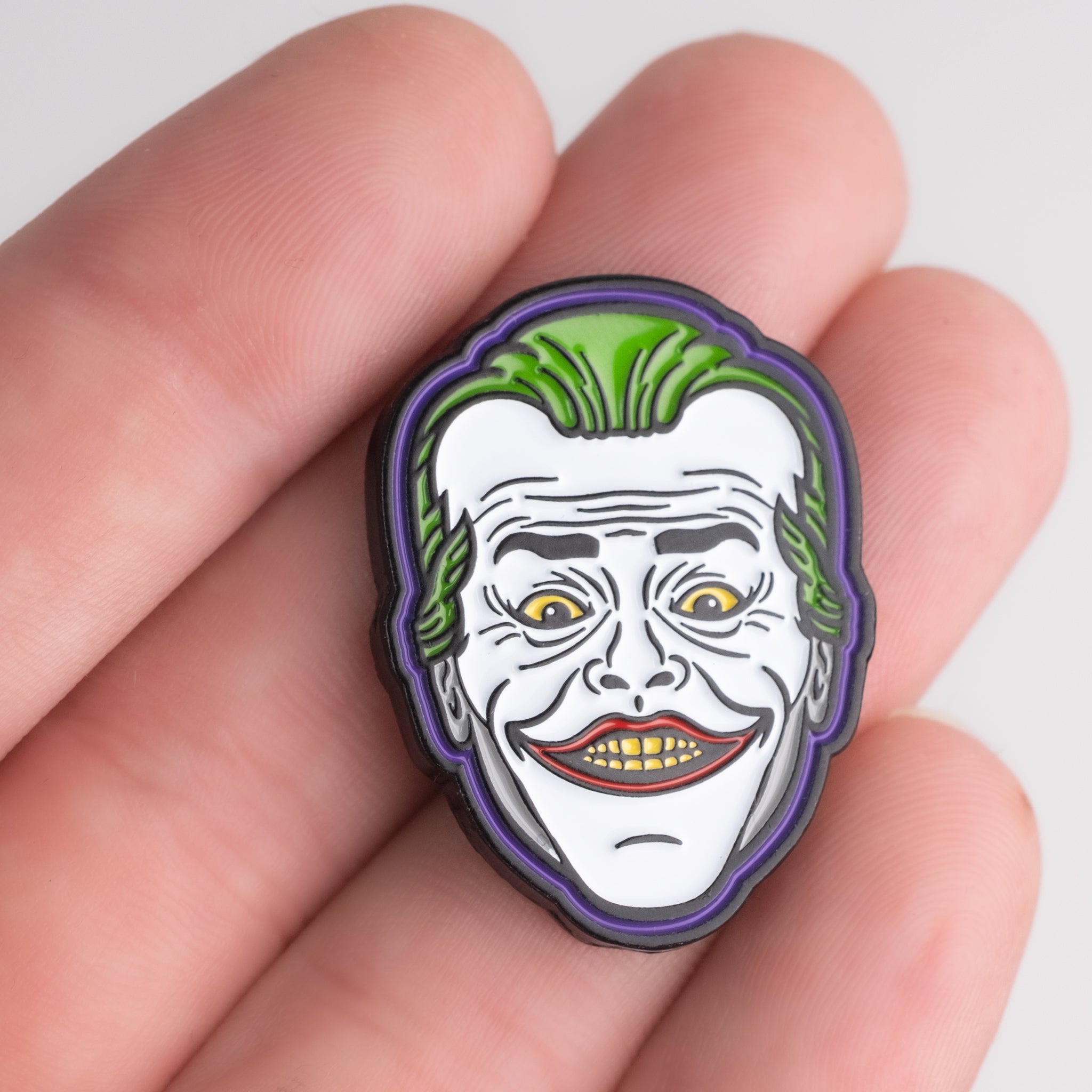 Joker Ball Marker 3.0 featuring a colorful Joker face design, perfect for adding personality to your golf game.
