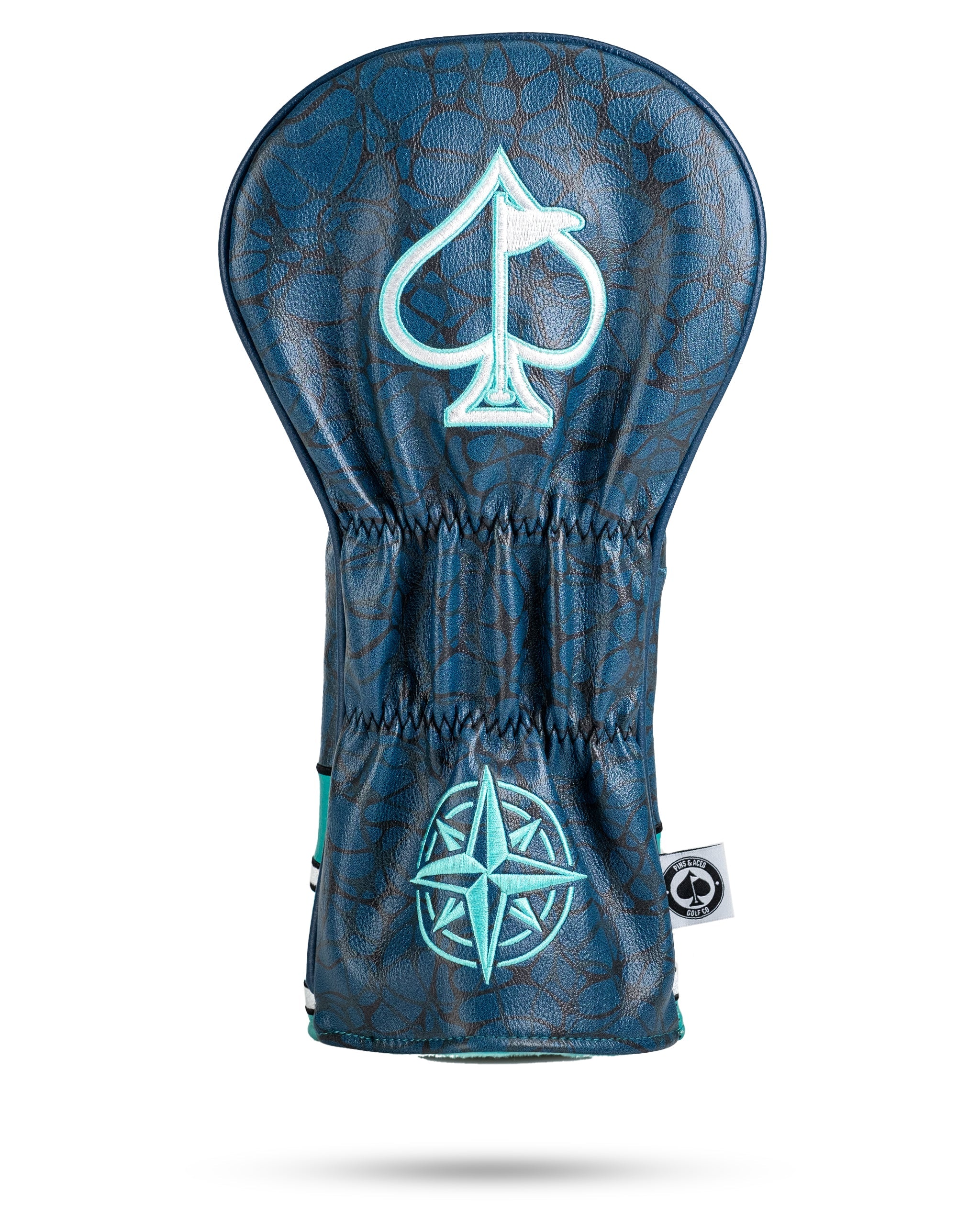 Bold Kraken driver cover featuring a blue and brown design with an ace of spades and compass emblem for stylish protection.