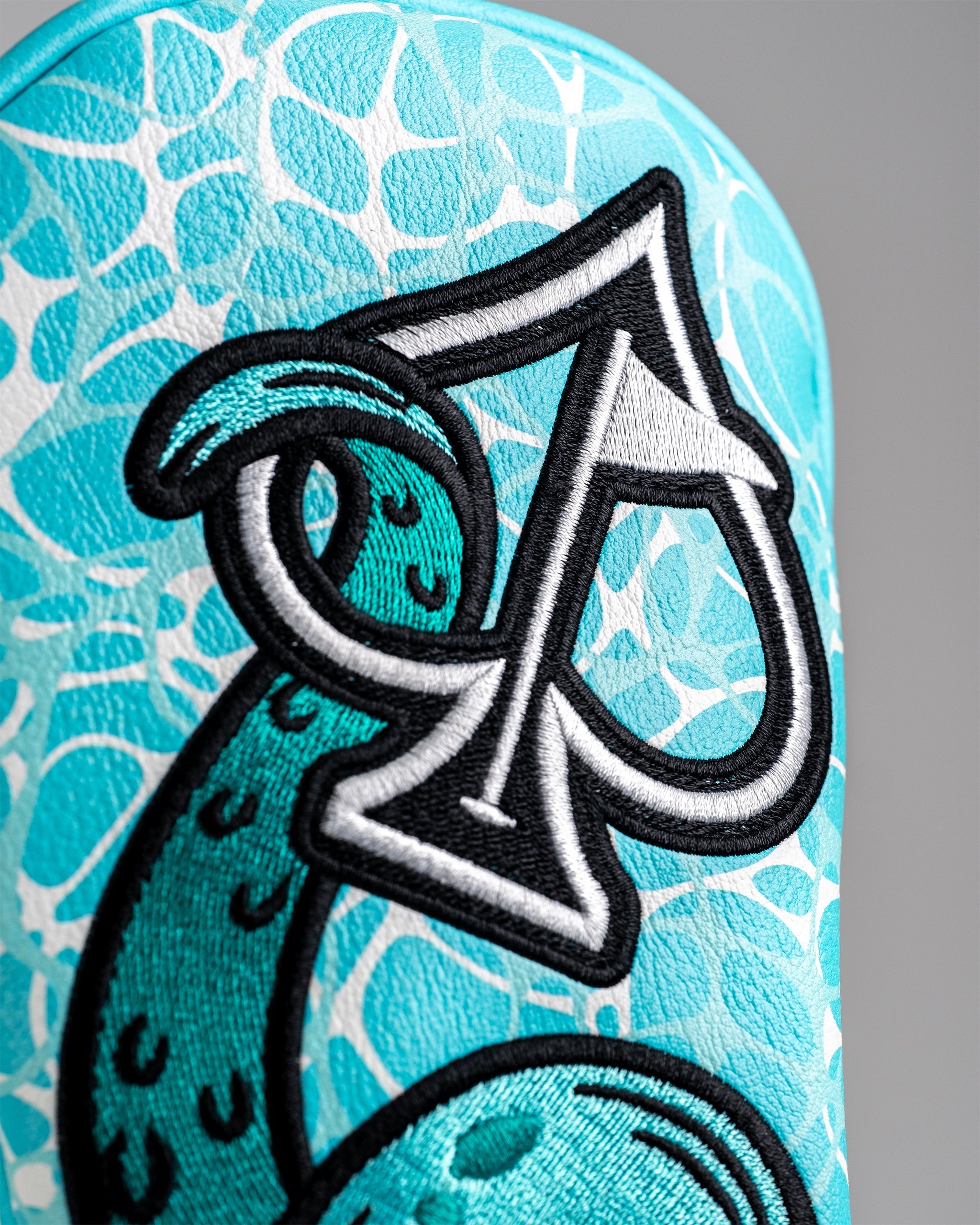 Bold Kraken fairway cover featuring a vibrant blue design with a stylized spade and tentacle motif for standout style.