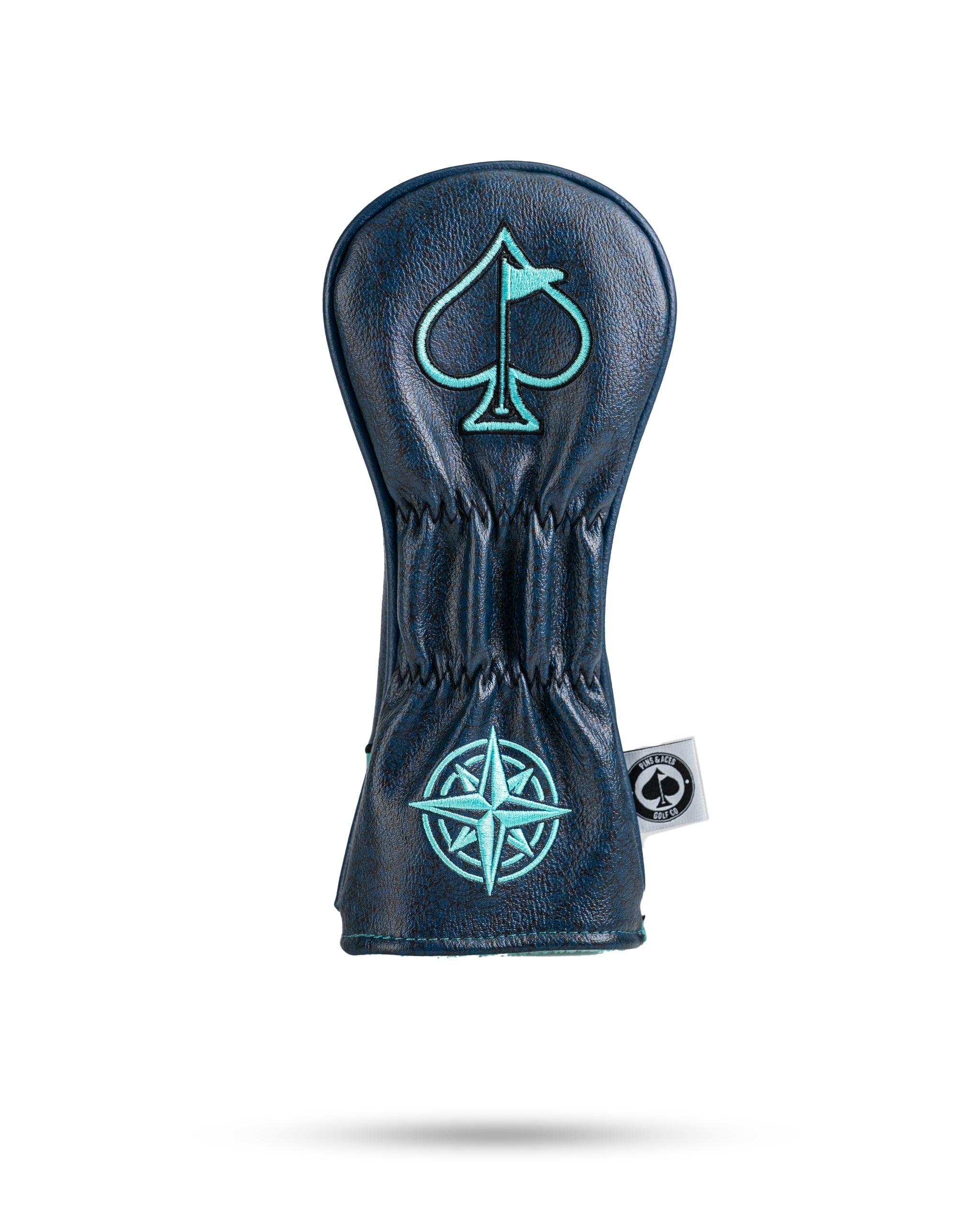 Kraken hybrid golf cover featuring a navy leather design with a spade and compass logo, perfect for stylish golfers.