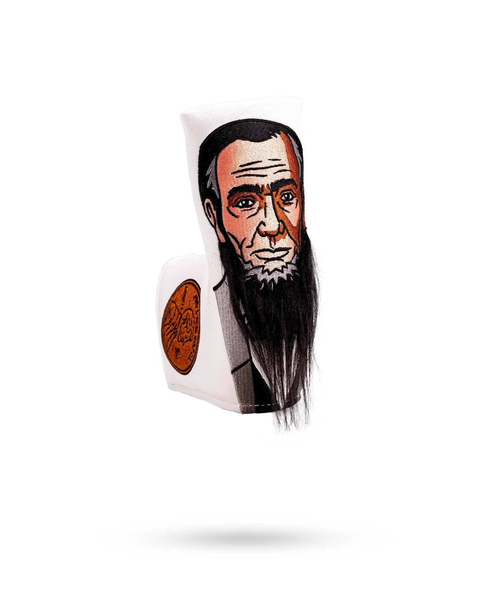 Lincoln Blade Putter Cover featuring a detailed illustration of Abraham Lincoln with a textured beard, perfect for golfers.