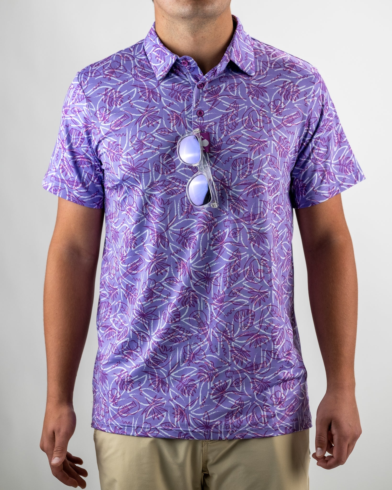 Men's Margaritaville 5 O'Clock Sunset shirt featuring a vibrant purple leaf pattern, perfect for a relaxed, stylish look.