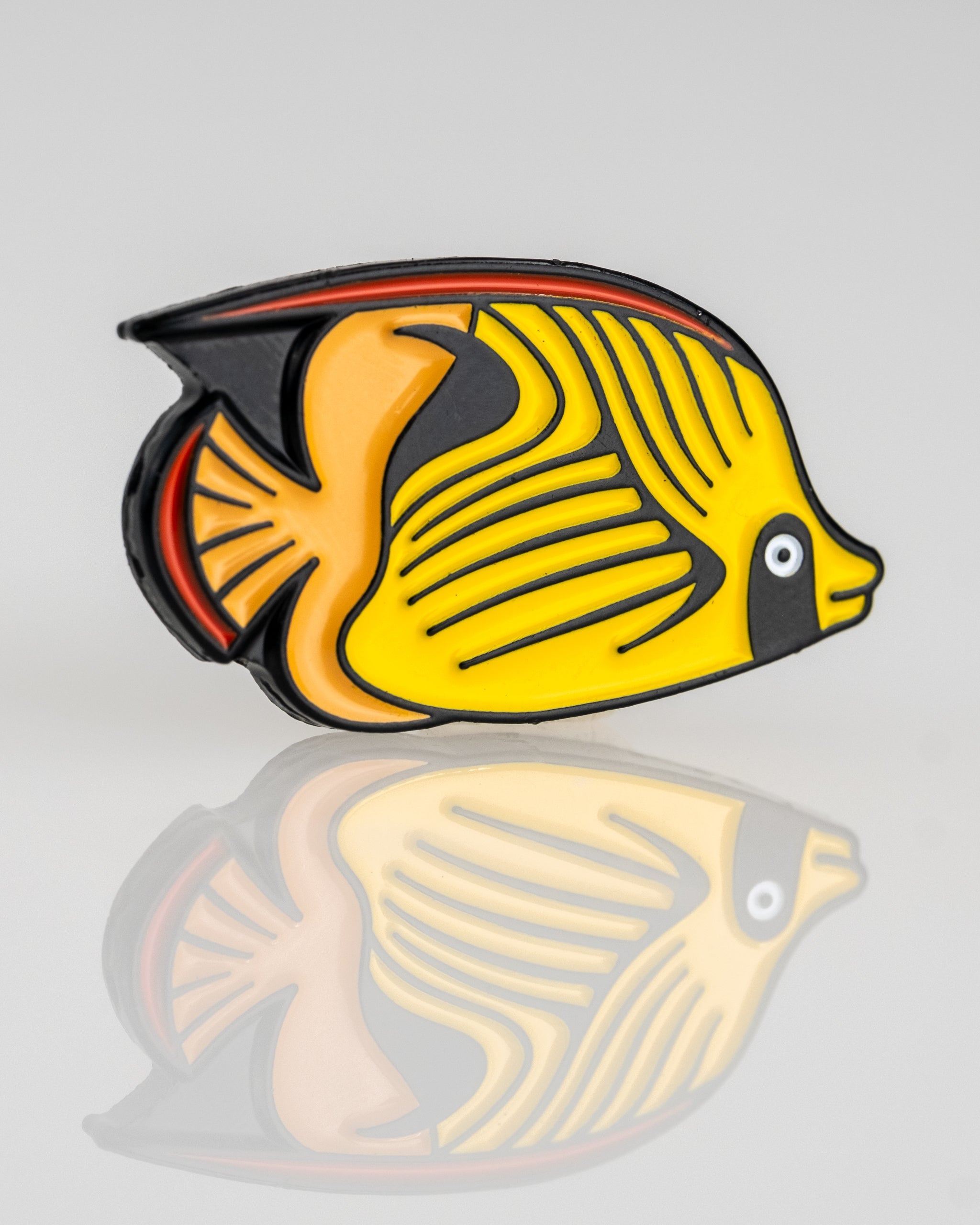 Colorful Margaritaville angel fish ball marker featuring vibrant yellow and black details, perfect for golf enthusiasts.