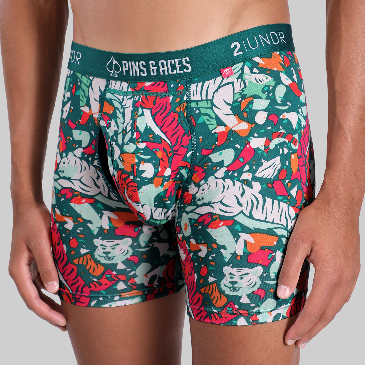 Bold 2UNDR x P&A Swing Shift 6" Box Briefs featuring a vibrant tiger print design, perfect for stylish comfort on the course.