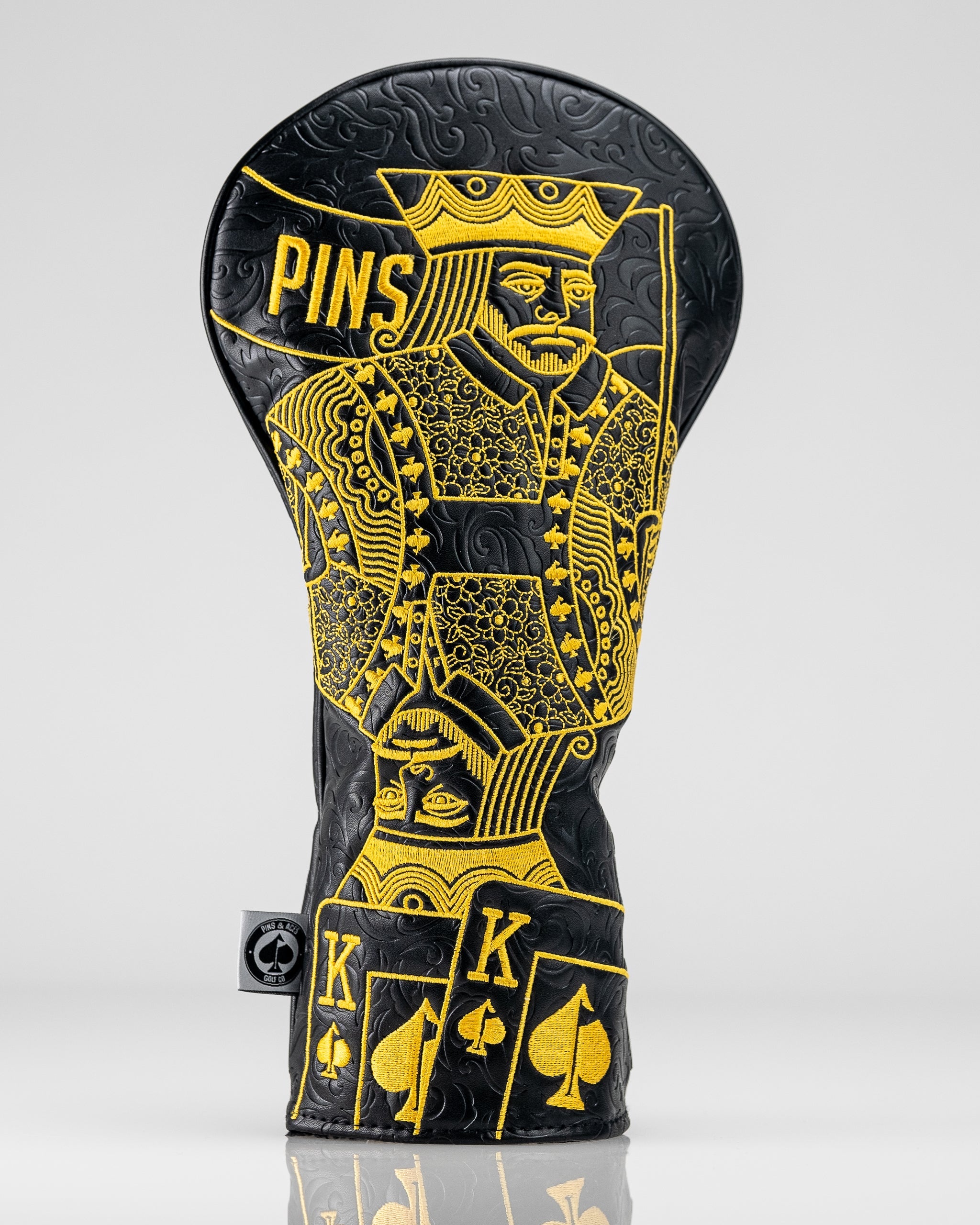Black and gold driver cover featuring a King of Spades design, perfect for golfers seeking bold style on the course.