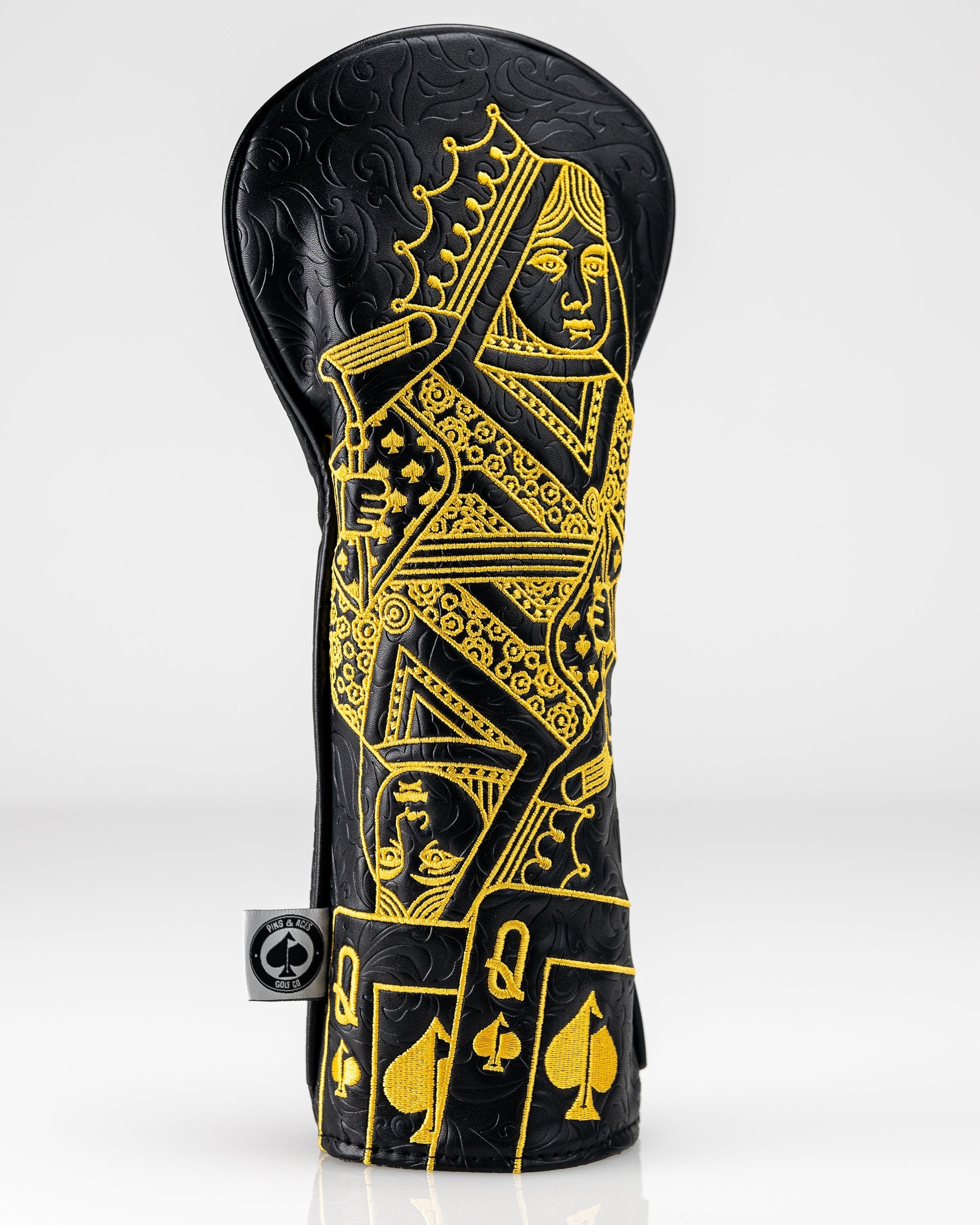 Black and gold Queen of Spades fairway cover featuring intricate designs, perfect for golfers seeking a bold accessory.