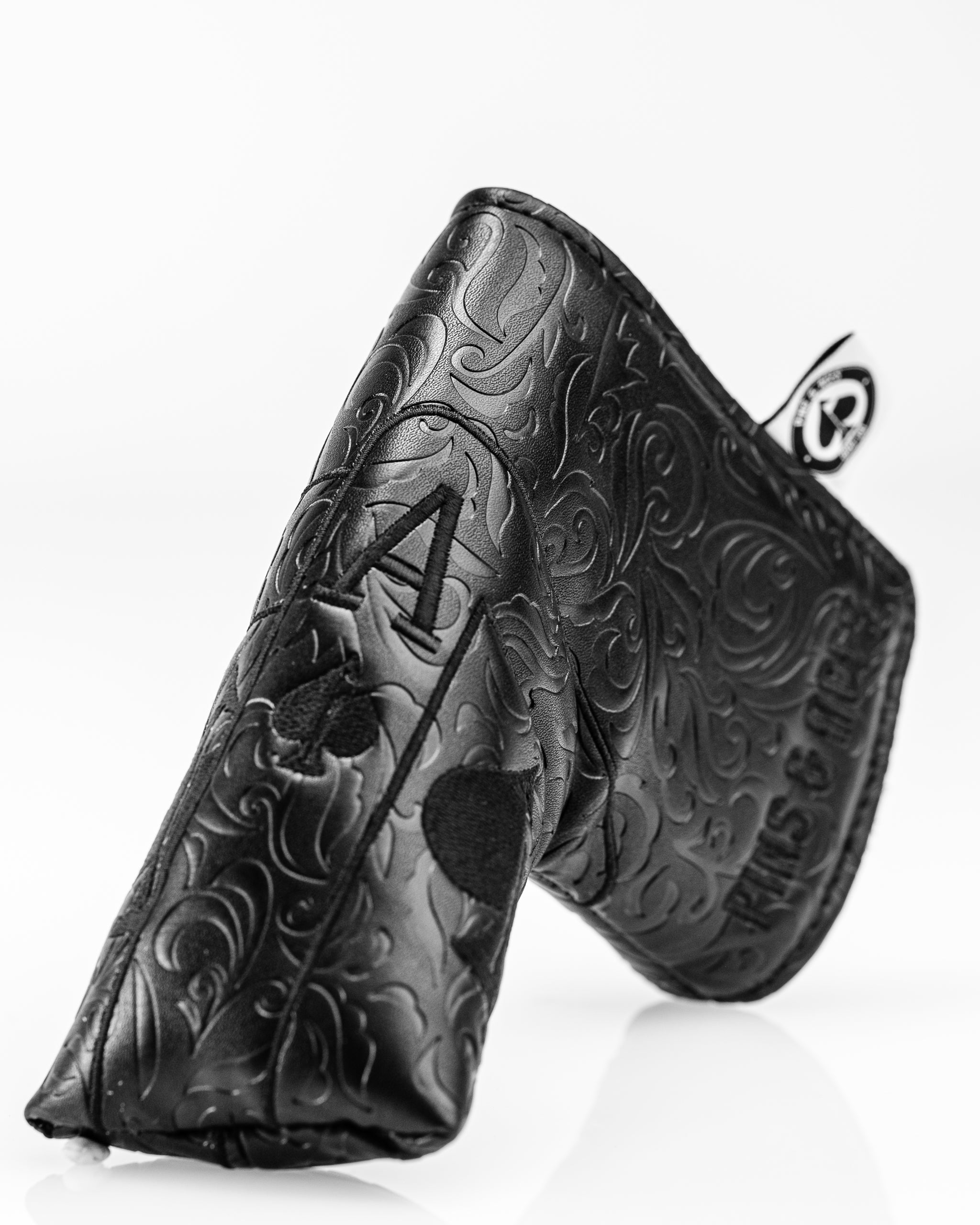 Blackout Ace of Spades blade putter cover featuring intricate black design and embossed logo for stylish golf protection.