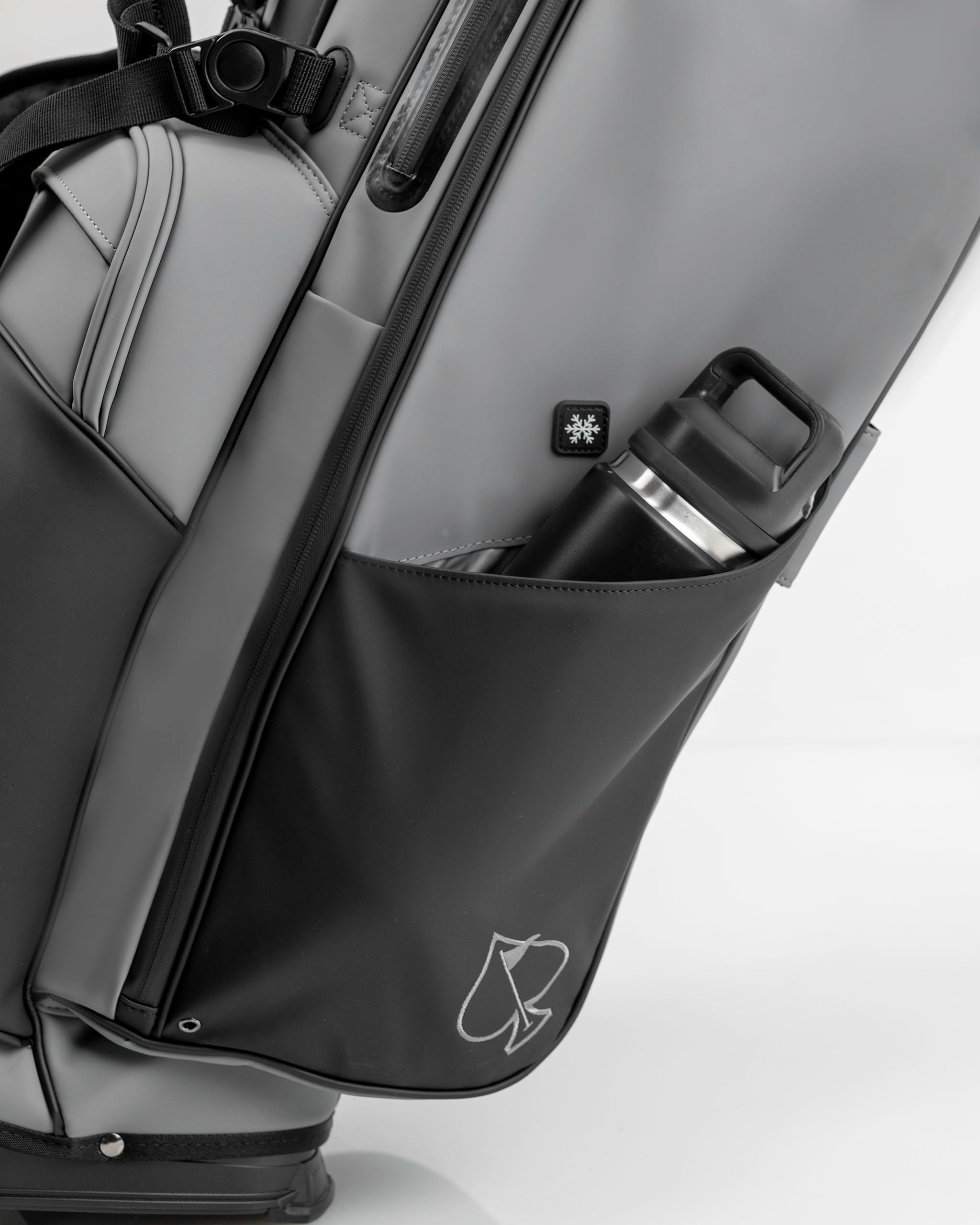 Stylish Player Preferred Golf Bag in Flat Ash with a side pocket for a water bottle, showcasing sleek design and functionality.