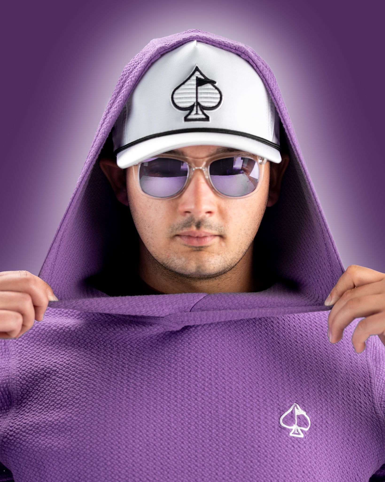 Player Preferred Waffle Knit Hoodie in grape color, featuring a stylish design and a hood, worn by a model with sunglasses.