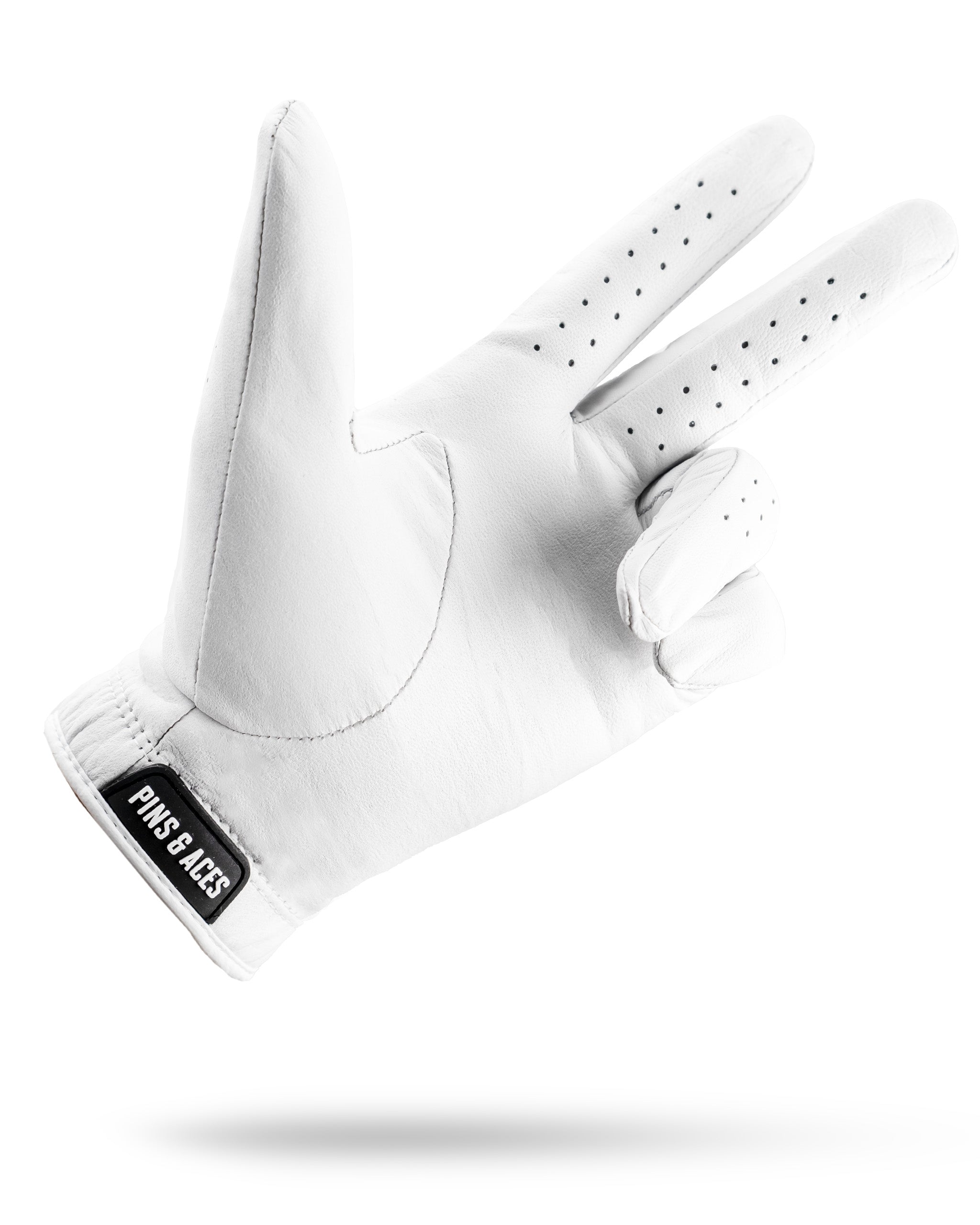 Premium Tour Glove in Ghost White, featuring a sleek design and perforations for breathability and grip.