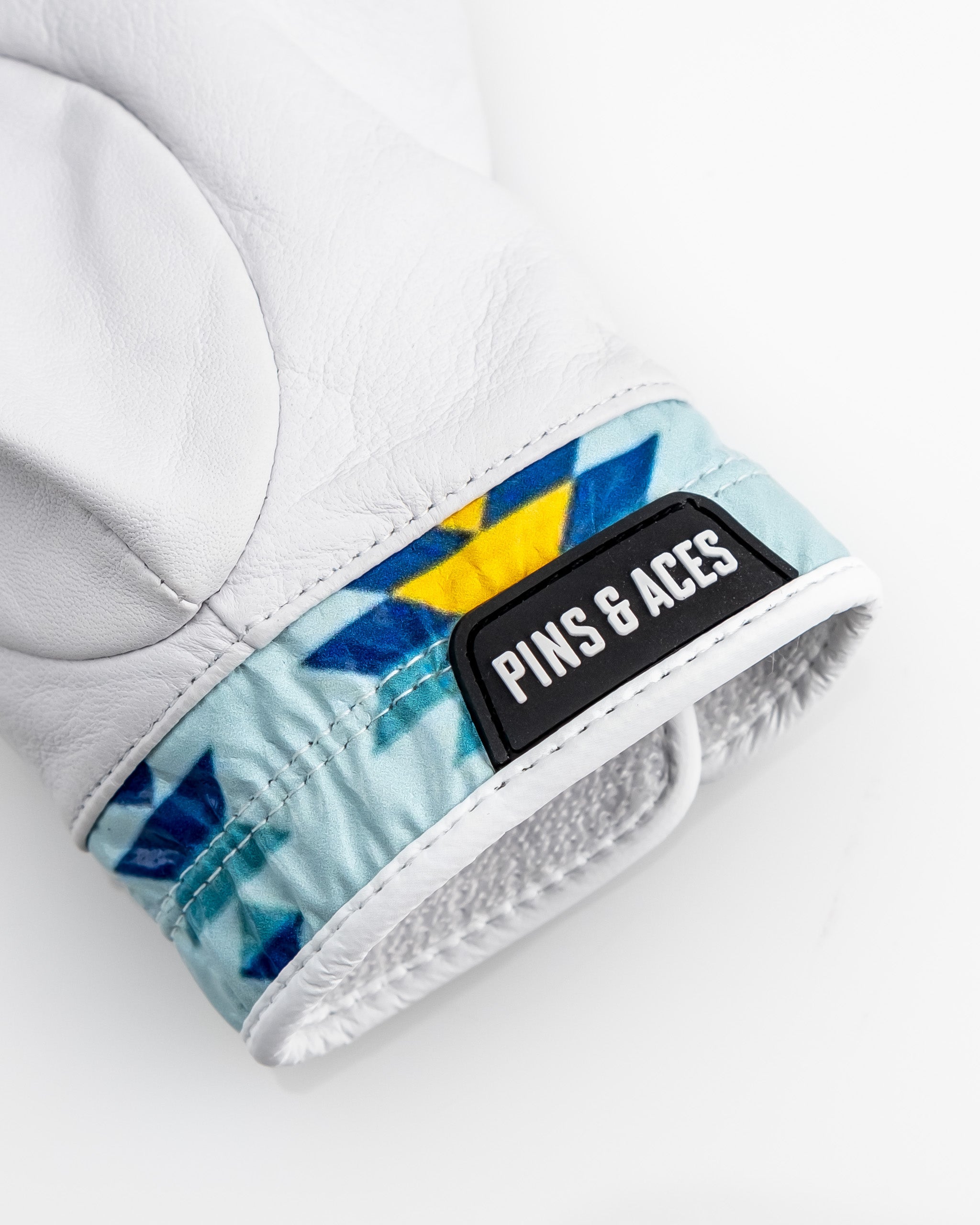 Premium Tour Glove in Southwest Sunset design featuring a colorful patterned cuff and soft leather construction.