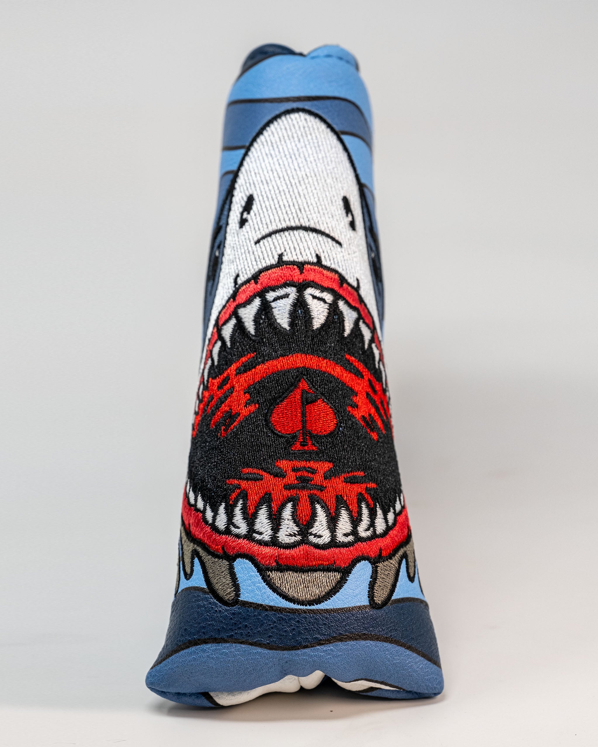 Bold Shark Attack blade putter cover featuring a fierce shark design with vibrant colors, perfect for standout golf style.