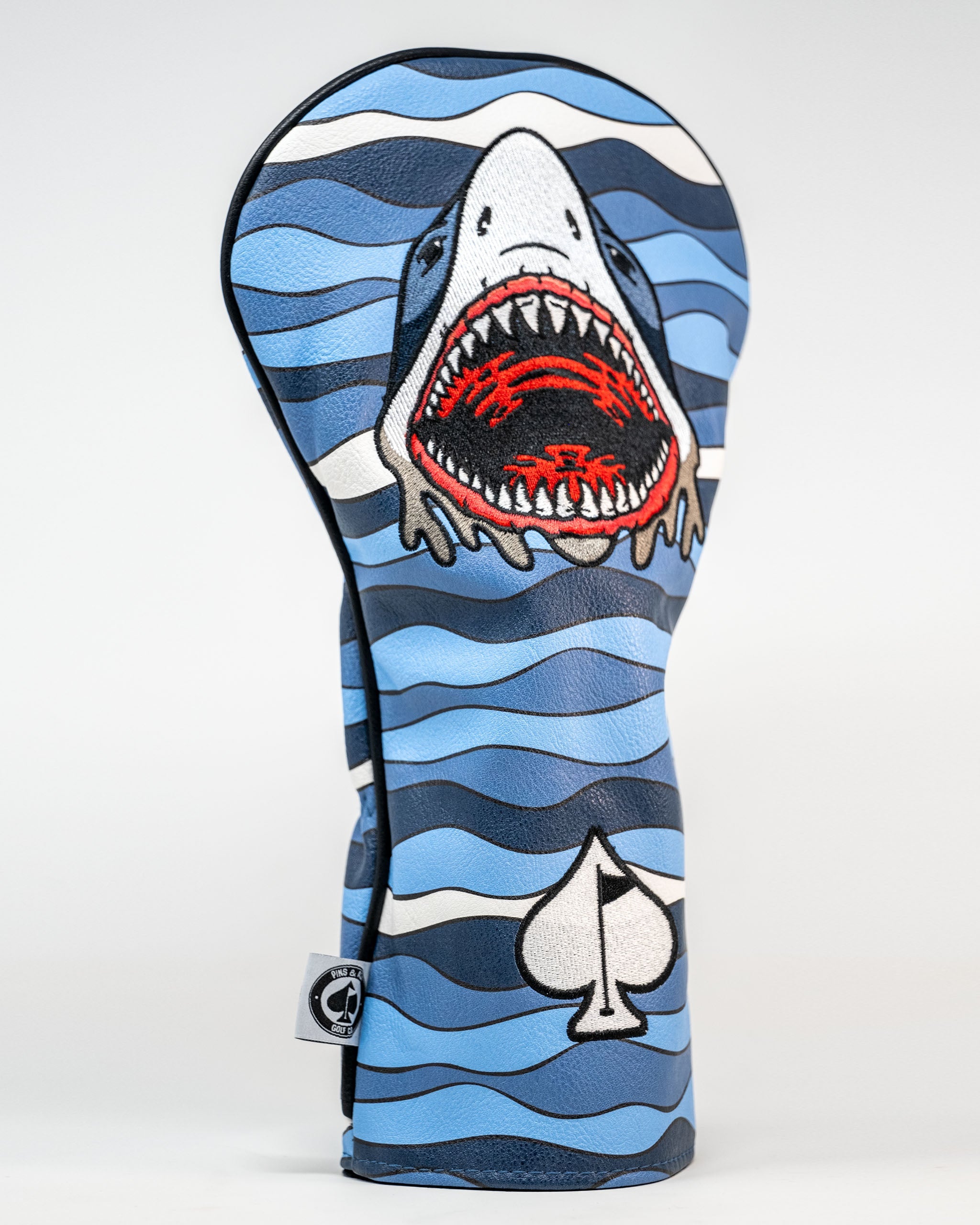 Bold Shark Attack driver cover featuring a fierce shark design against blue waves, perfect for standout golf style.