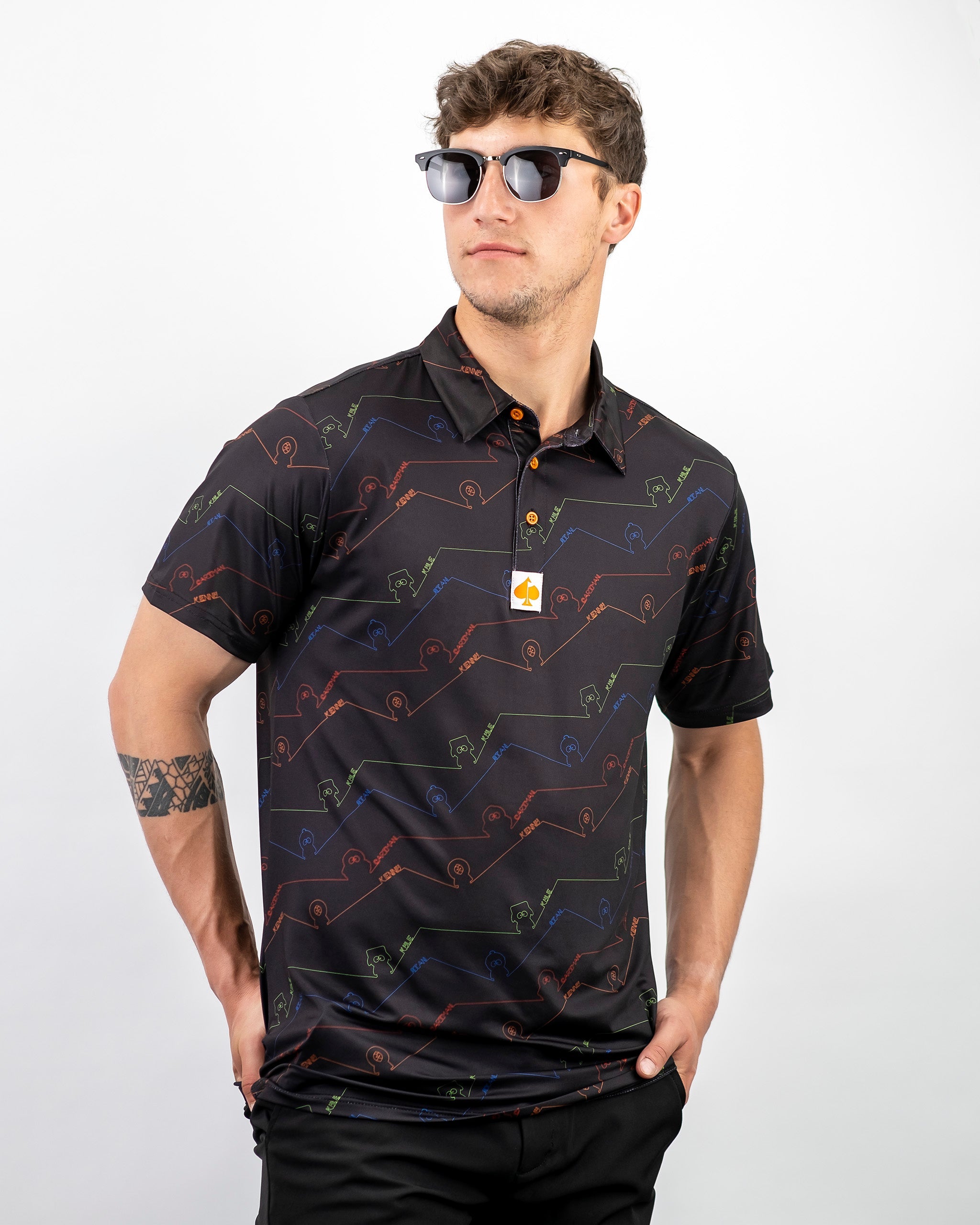Bold South Park signature polo shirt featuring colorful graphics on a black background, perfect for standout golf style.