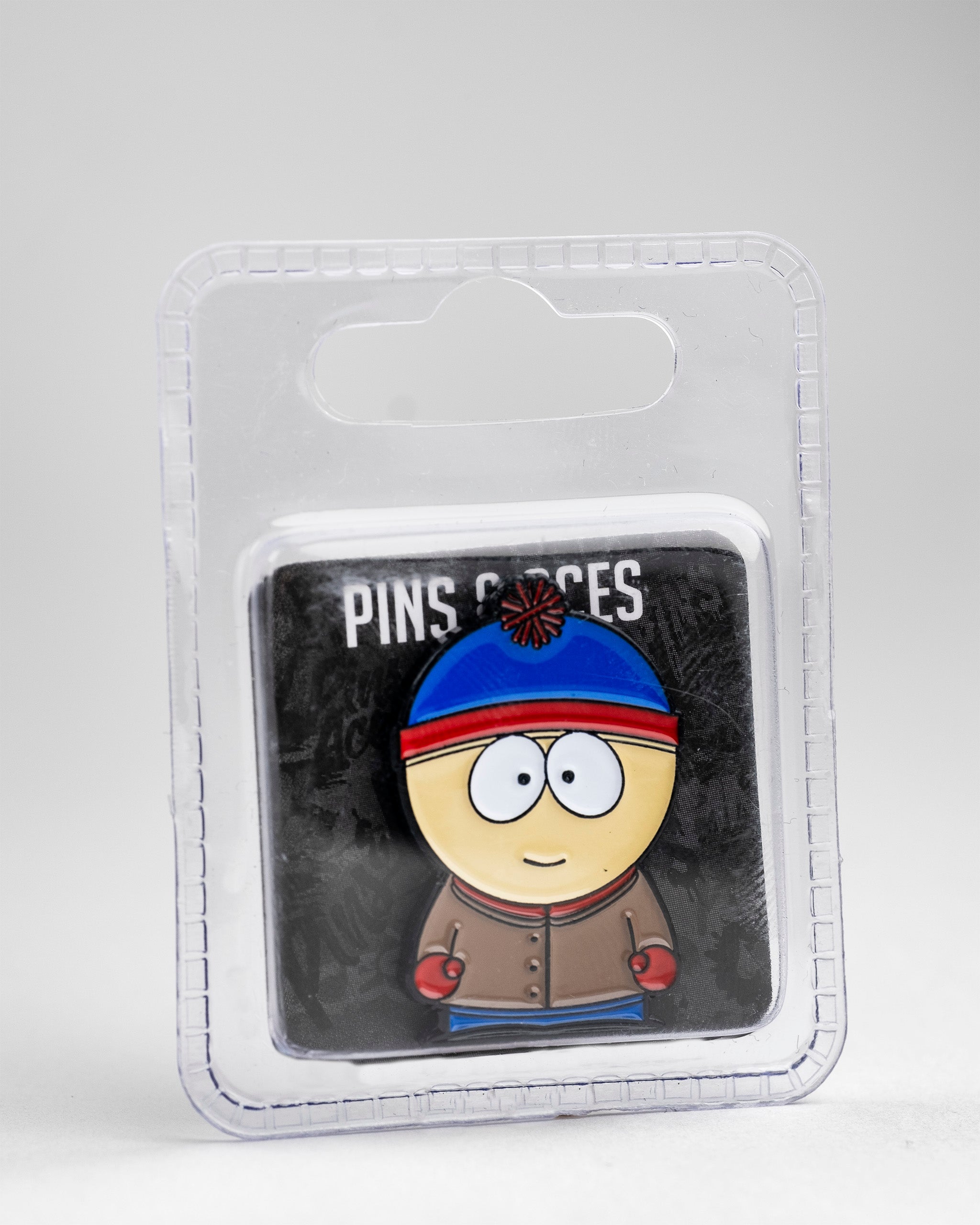 South Park Stan ball marker featuring his signature blue hat and brown jacket, packaged for golf enthusiasts.