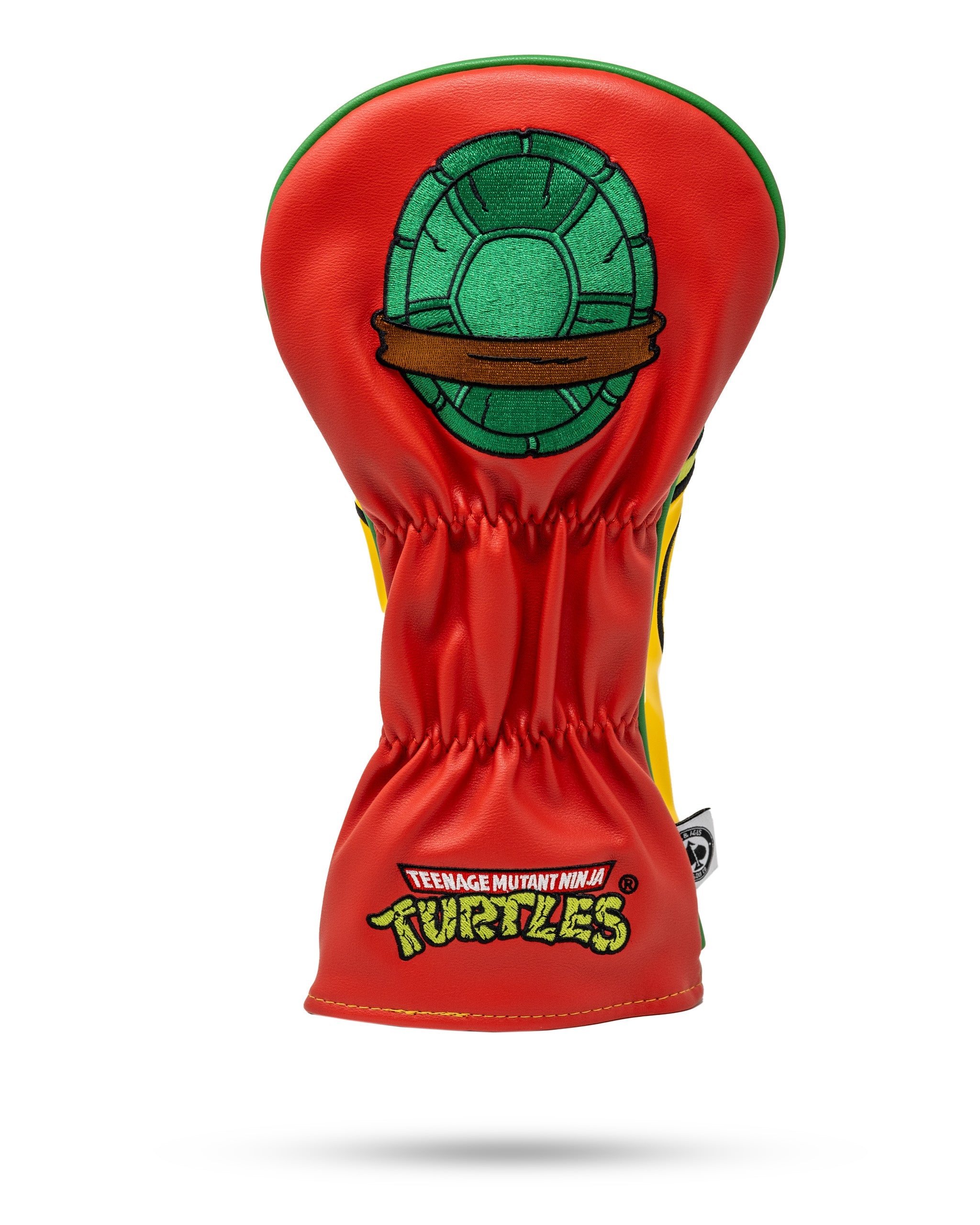 TMNT Raphael driver cover featuring a vibrant red design with a turtle shell graphic and Teenage Mutant Ninja Turtles logo.
