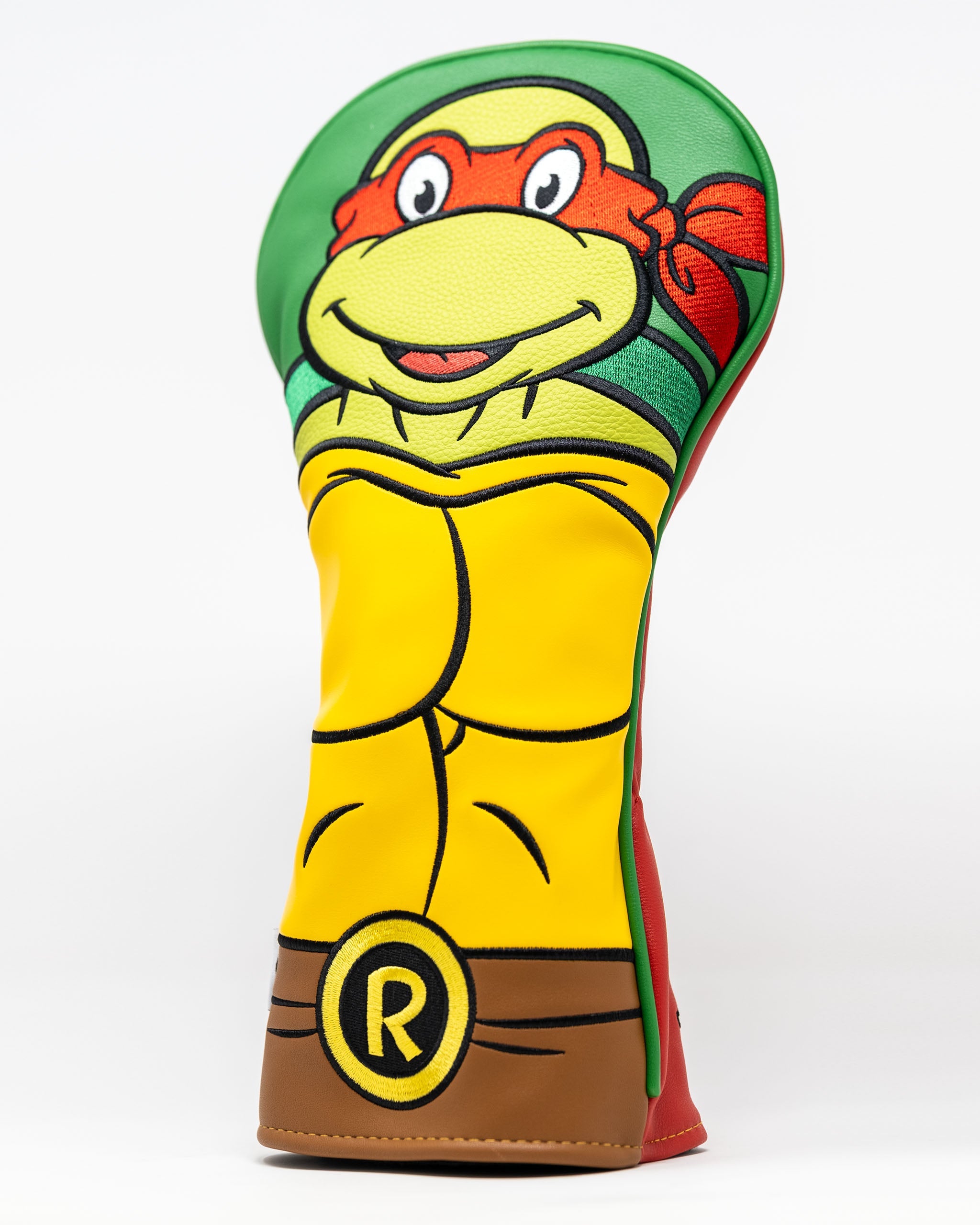 TMNT Raphael driver cover featuring vibrant colors and a detailed design of the character's face and body.