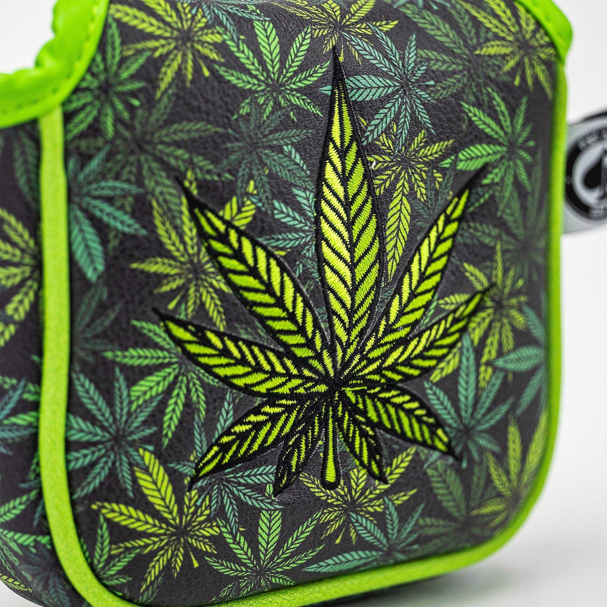 Bright green cannabis leaf pattern on black background, bold and eye-catching golf headcover for stand-out style.