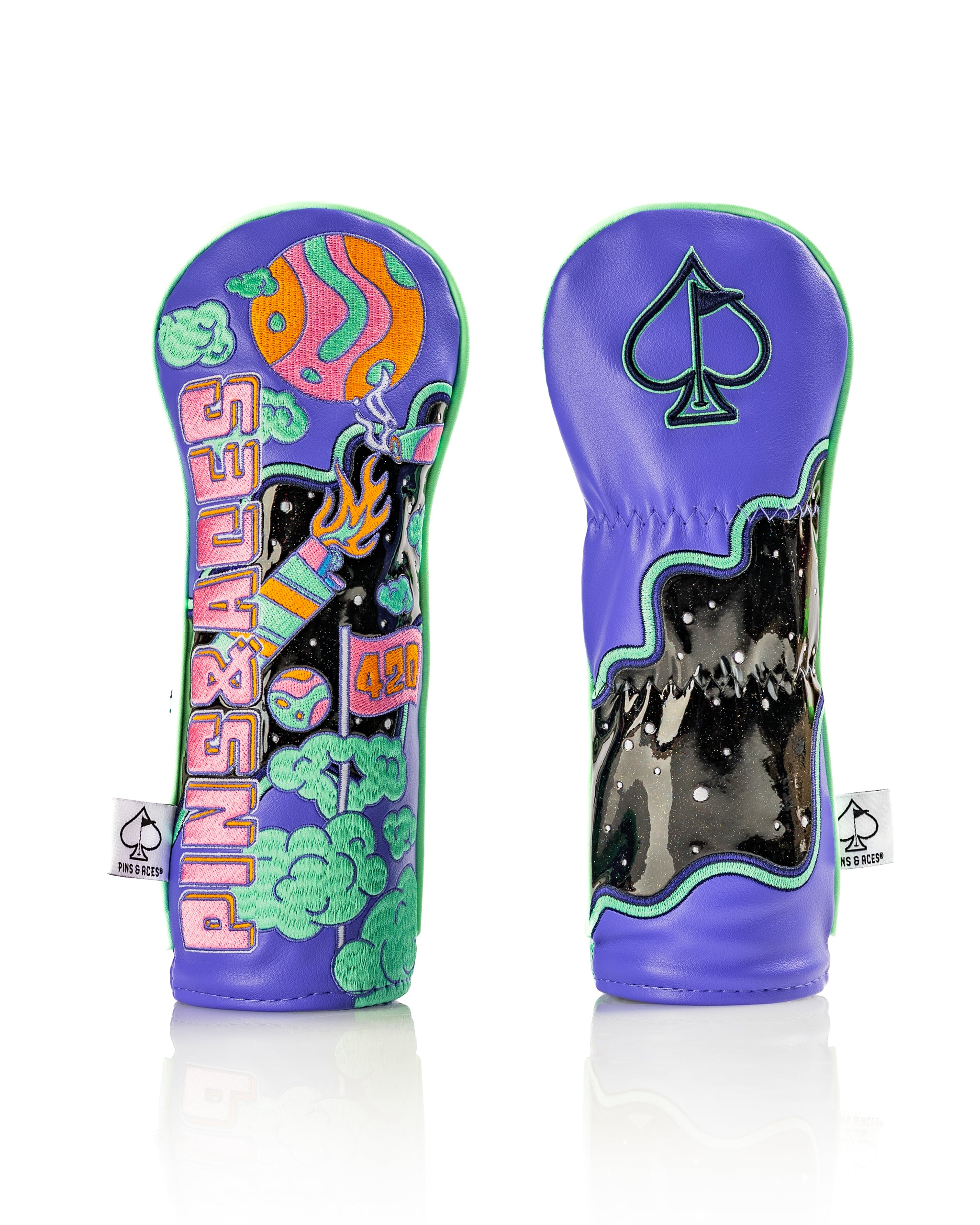 Bold purple hybrid cover featuring vibrant graphics of planets, flames, and clouds, designed for golfers who want to stand out.