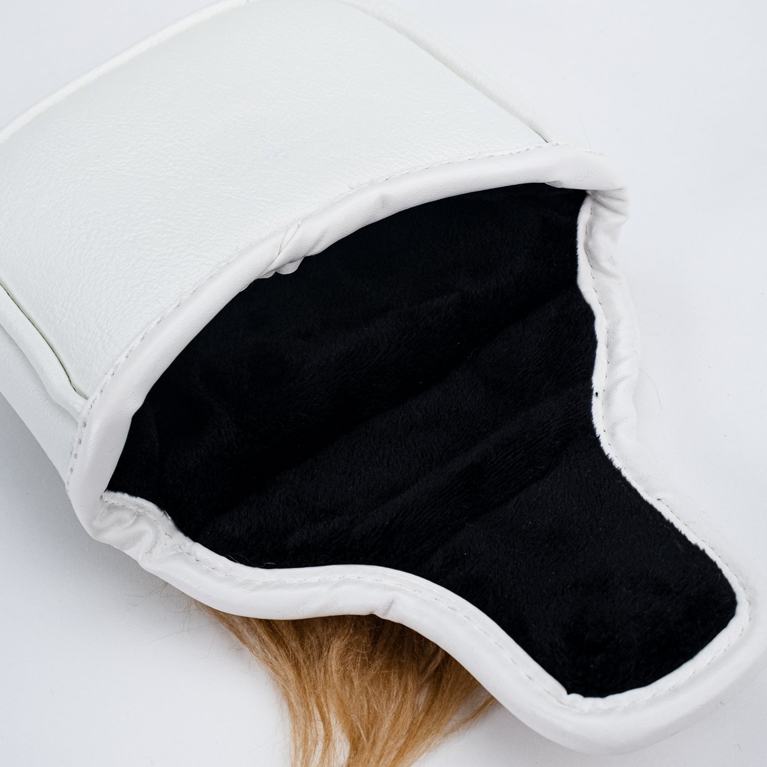 White mallet putter cover featuring a plush interior, designed for golfers seeking a bold accessory on the course.
