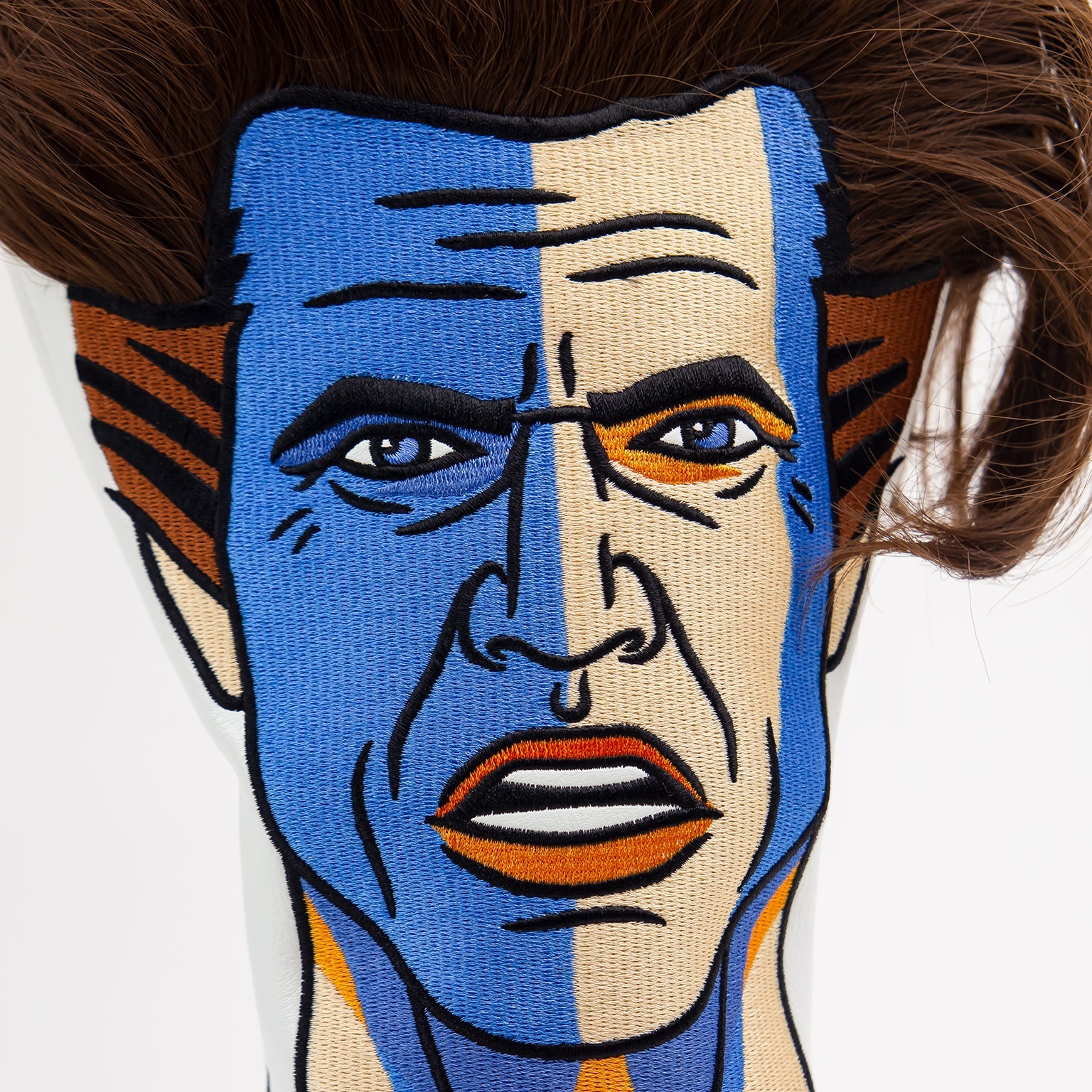 Bold driver cover featuring a detailed design of William Wallace with striking blue face paint and textured hair.