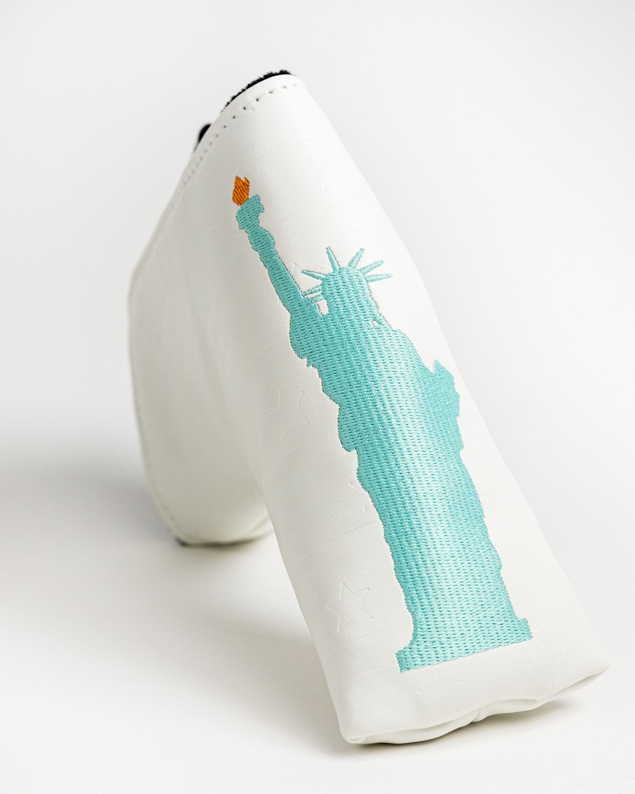 Liberty Blade Putter Cover featuring a patriotic red, white, and blue design with stars and stripes.