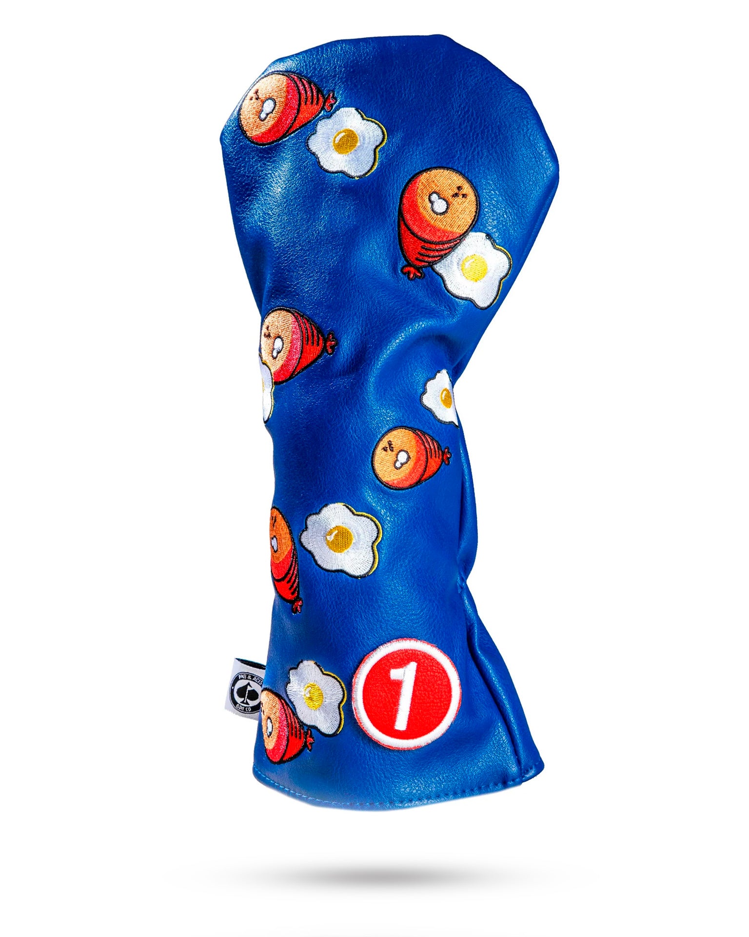 Alt text: "Ham & Eggs driver cover featuring a playful design with vibrant colors, ideal for golf enthusiasts."