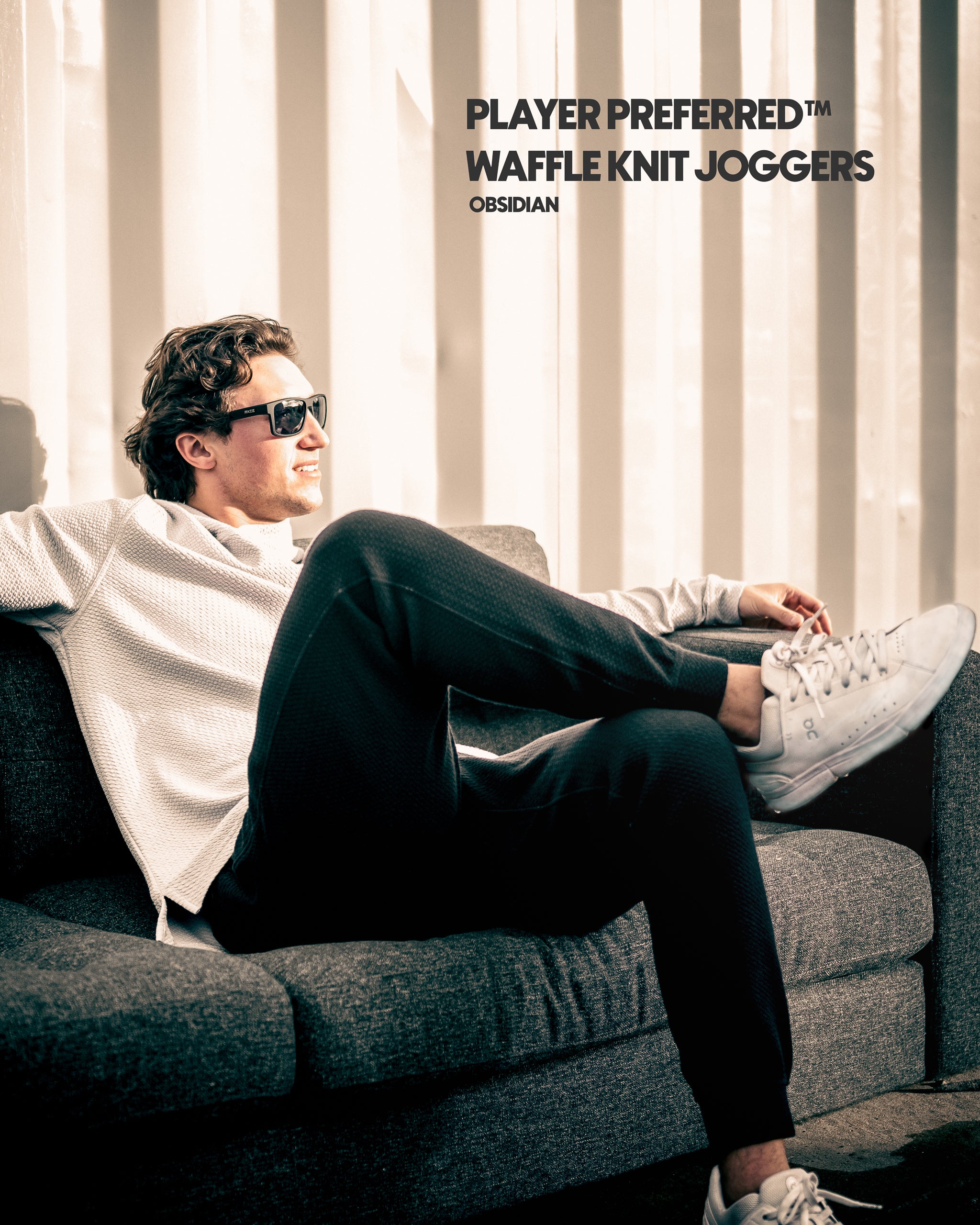 Alt text: Player Preferred™ Waffleknit Jogger in Obsidian, featuring a textured design and a relaxed fit, displayed in a casual lifestyle setting.