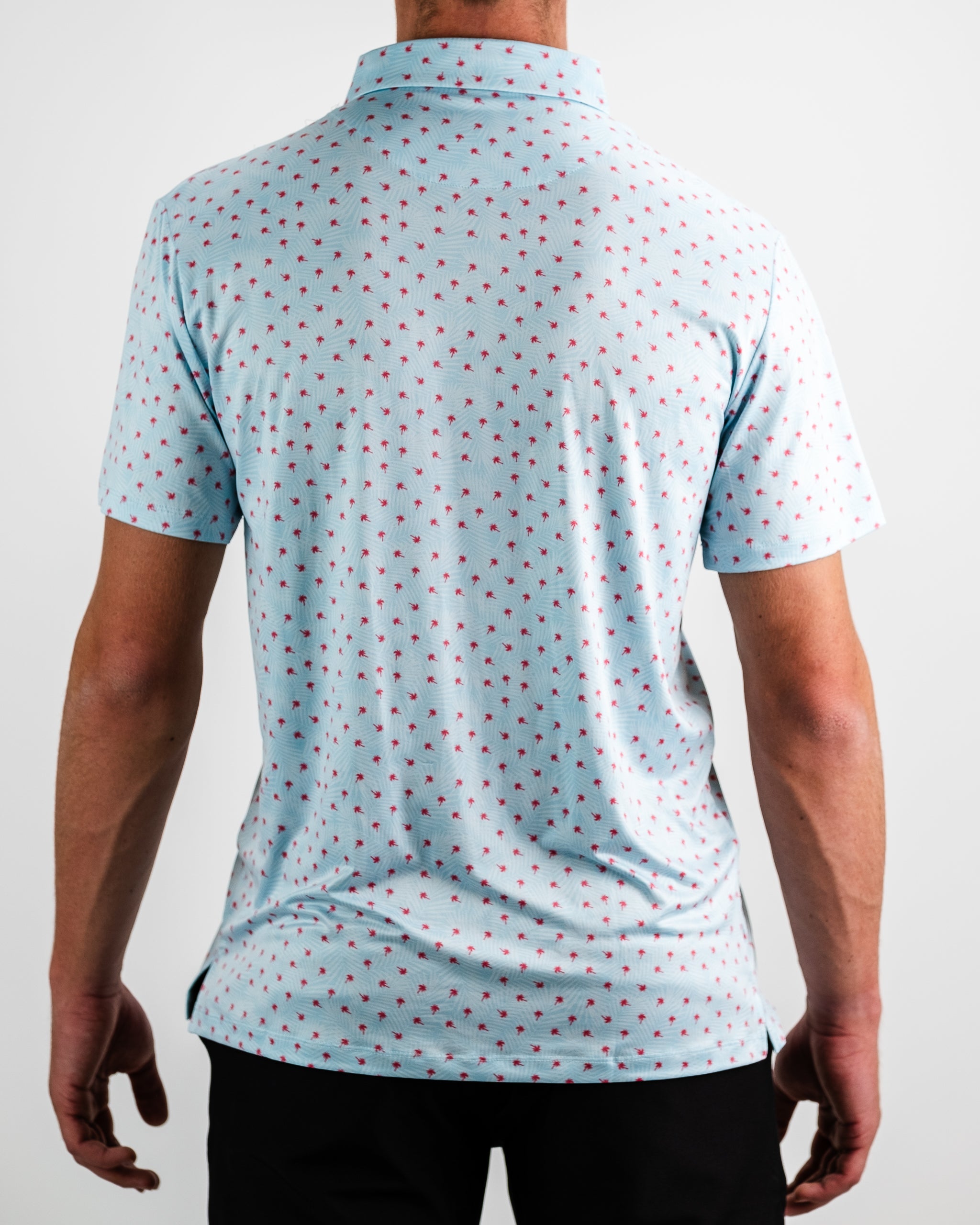 Palm Sunday Blue dress on a model, showcasing a flowing, elegant design with short sleeves and a cinched waist.