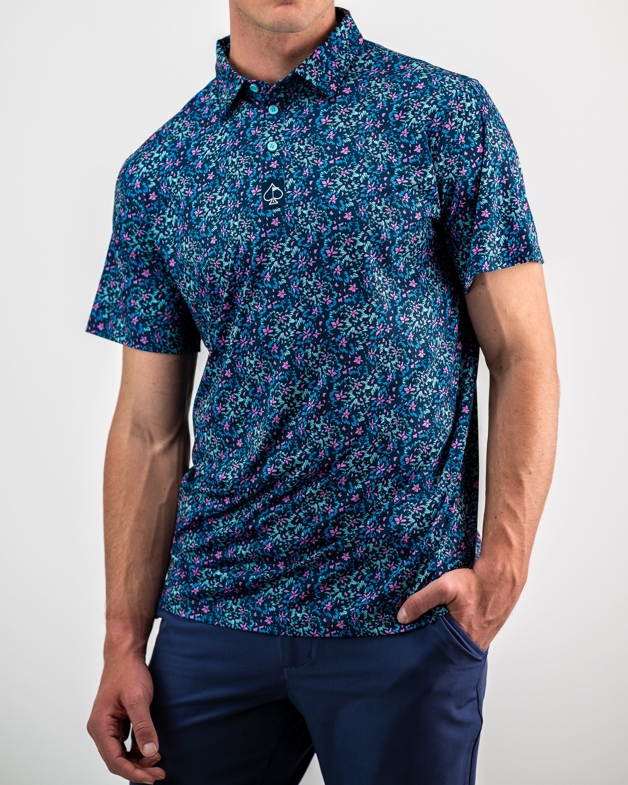 Fluorescent floral print fabric featuring vibrant colors and bold patterns.