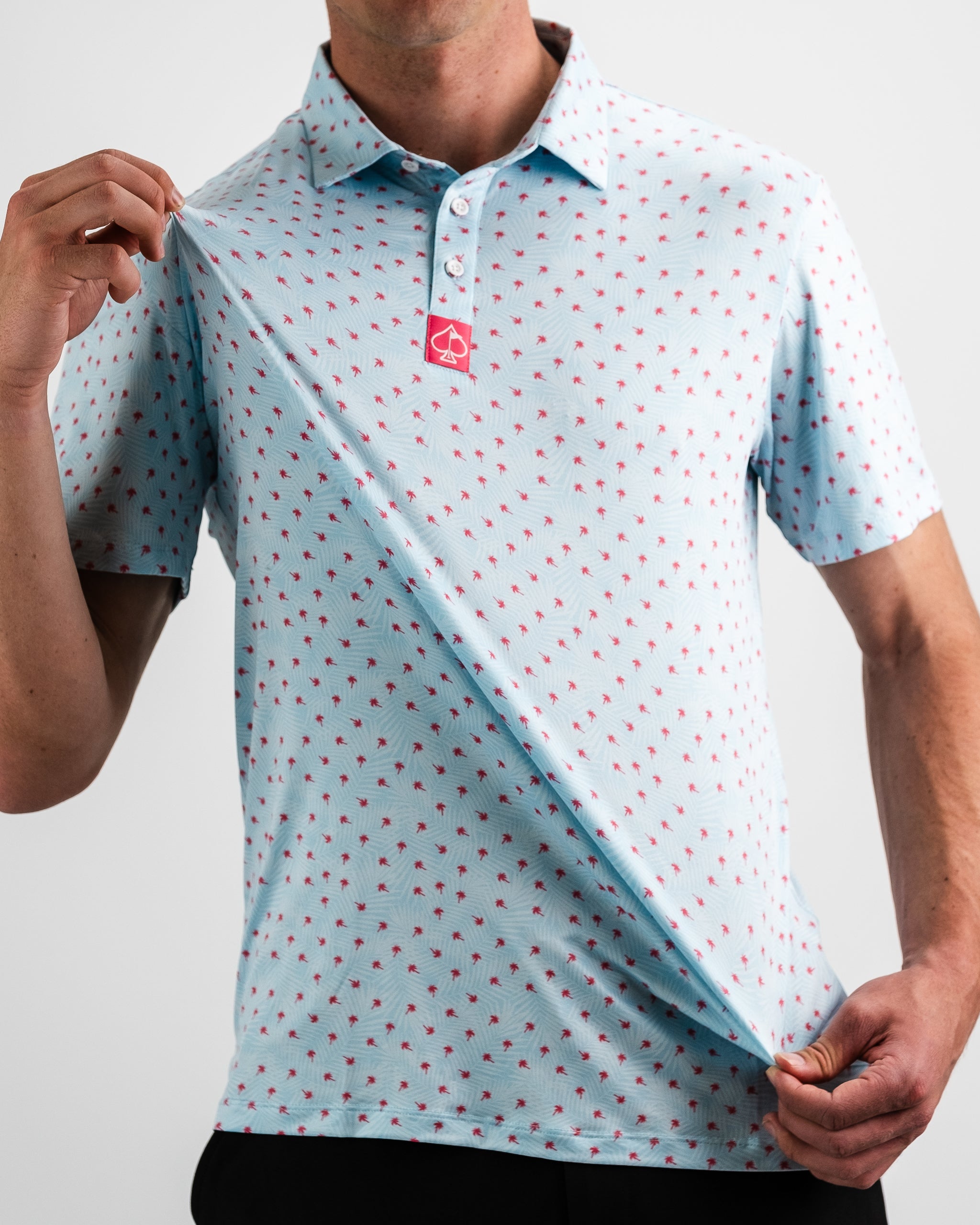 Palm Sunday Blue dress displayed on a model, showcasing a flowing design with short sleeves and a vibrant blue color against a neutral background.