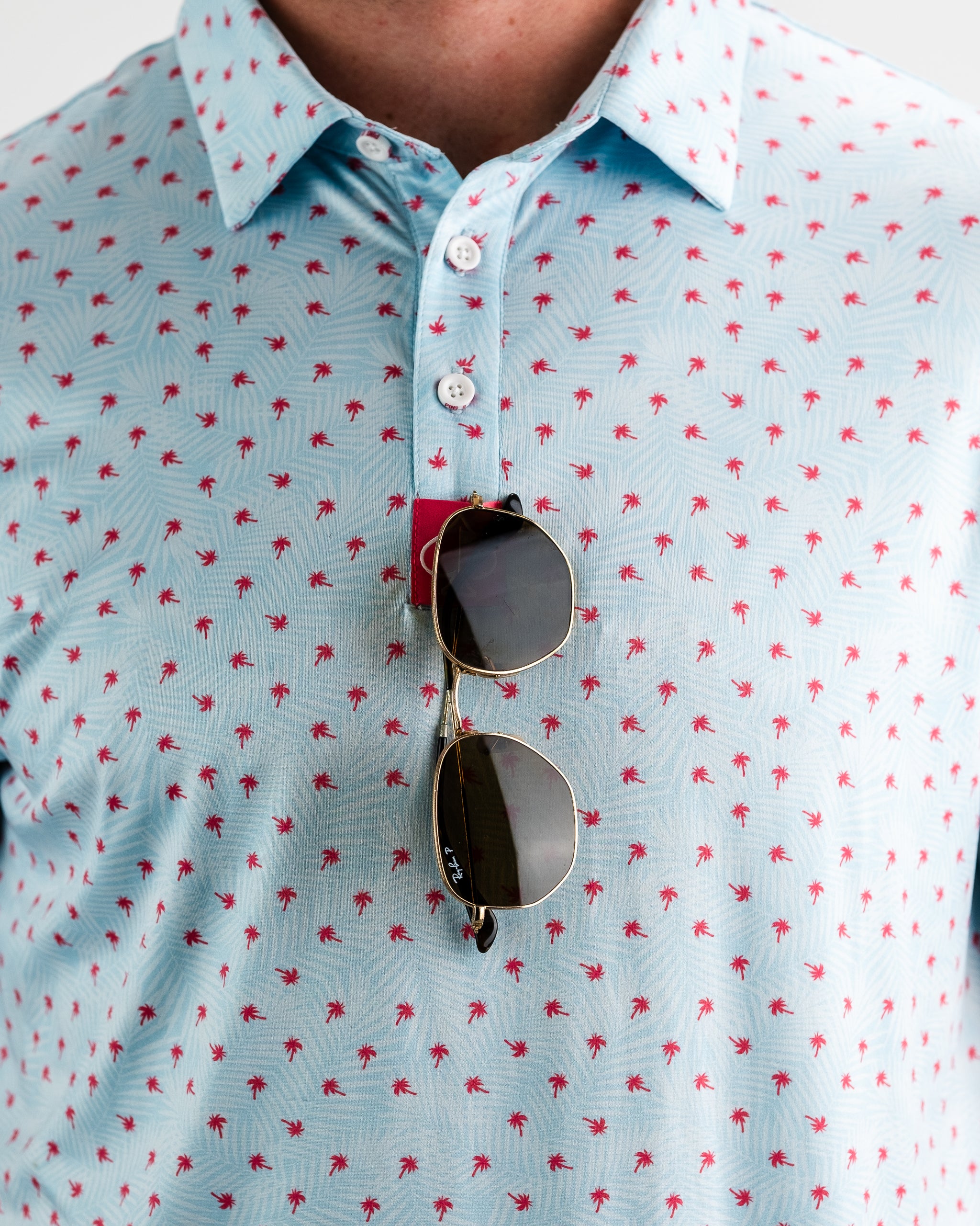 Palm Sunday Blue floral dress displayed on a white background, featuring short sleeves and a flowing silhouette.