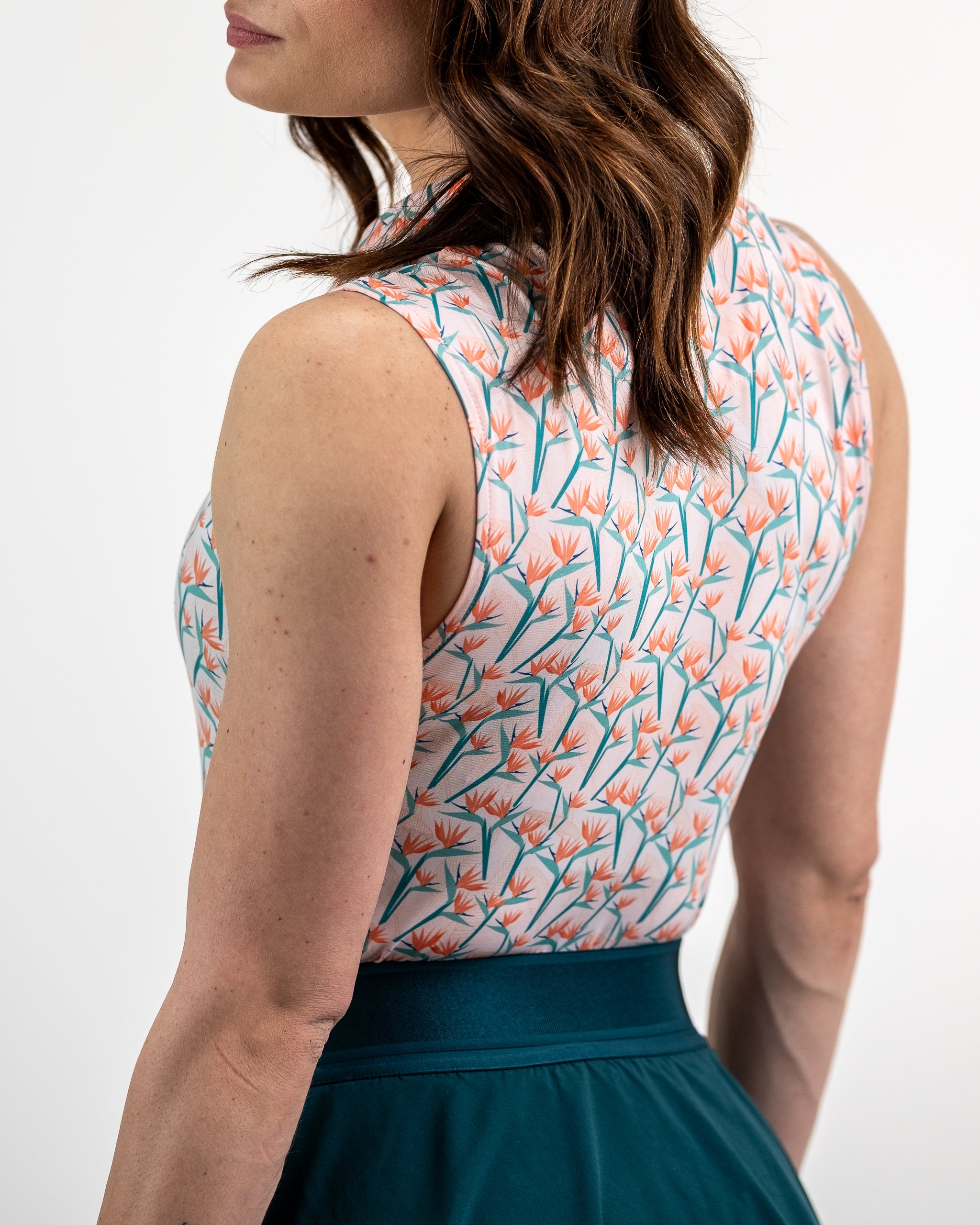 Women’s Birds of Paradise dress featuring a vibrant floral print, short sleeves, and a flattering silhouette. Ideal for spring outings.