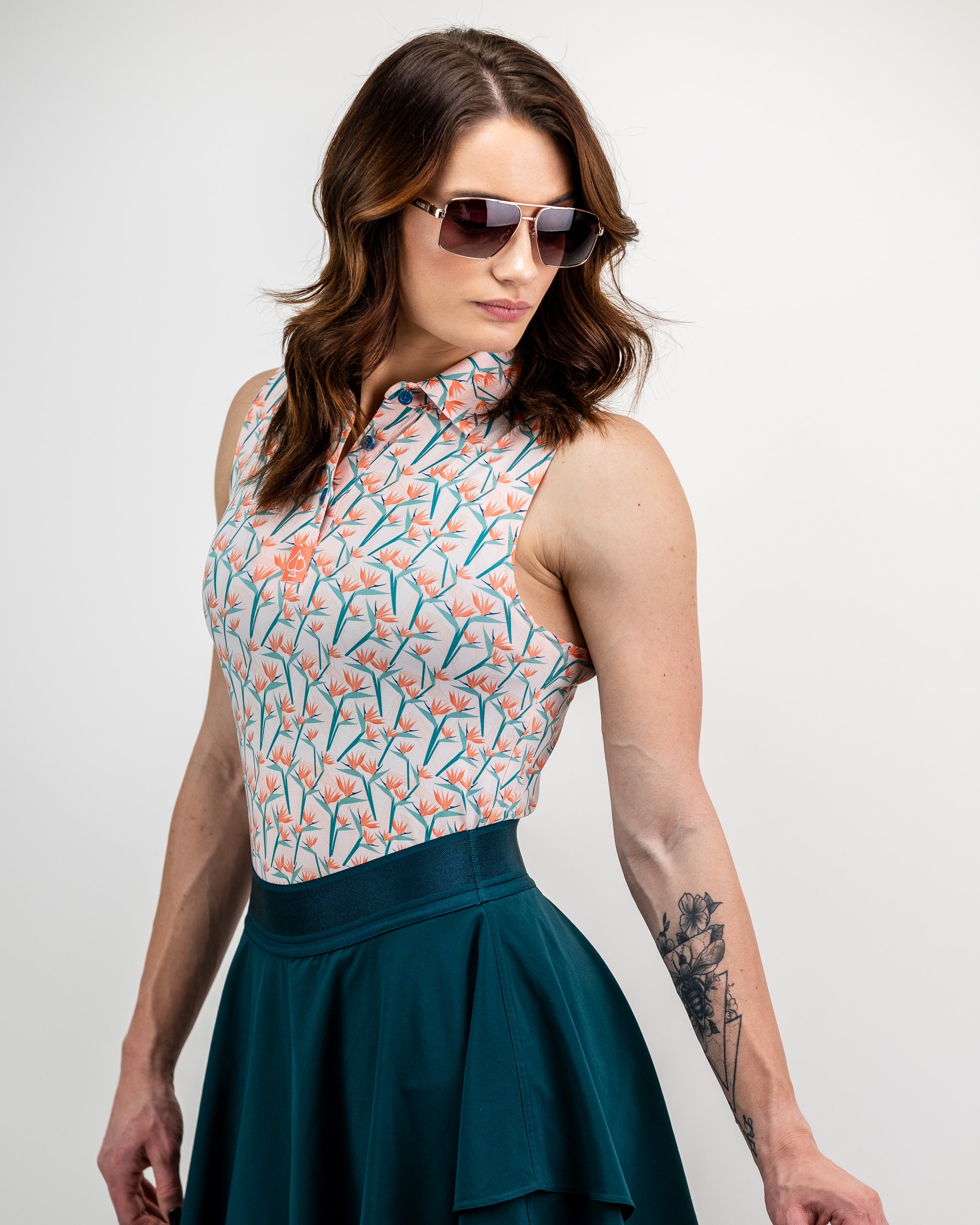 Alt text: Women's Birds of Paradise floral dress featuring vibrant colors and a flowing design, perfect for spring fashion.