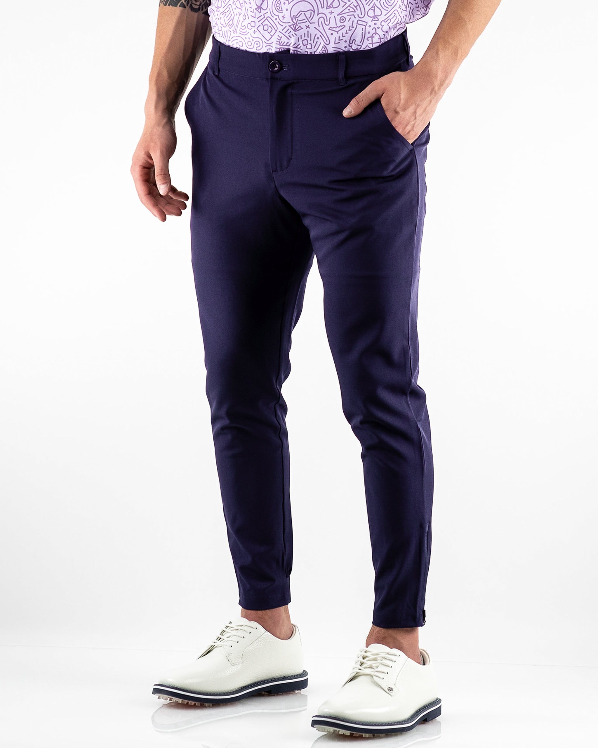 Navy performance jogger displayed on a model, featuring a sleek design and comfortable fit.