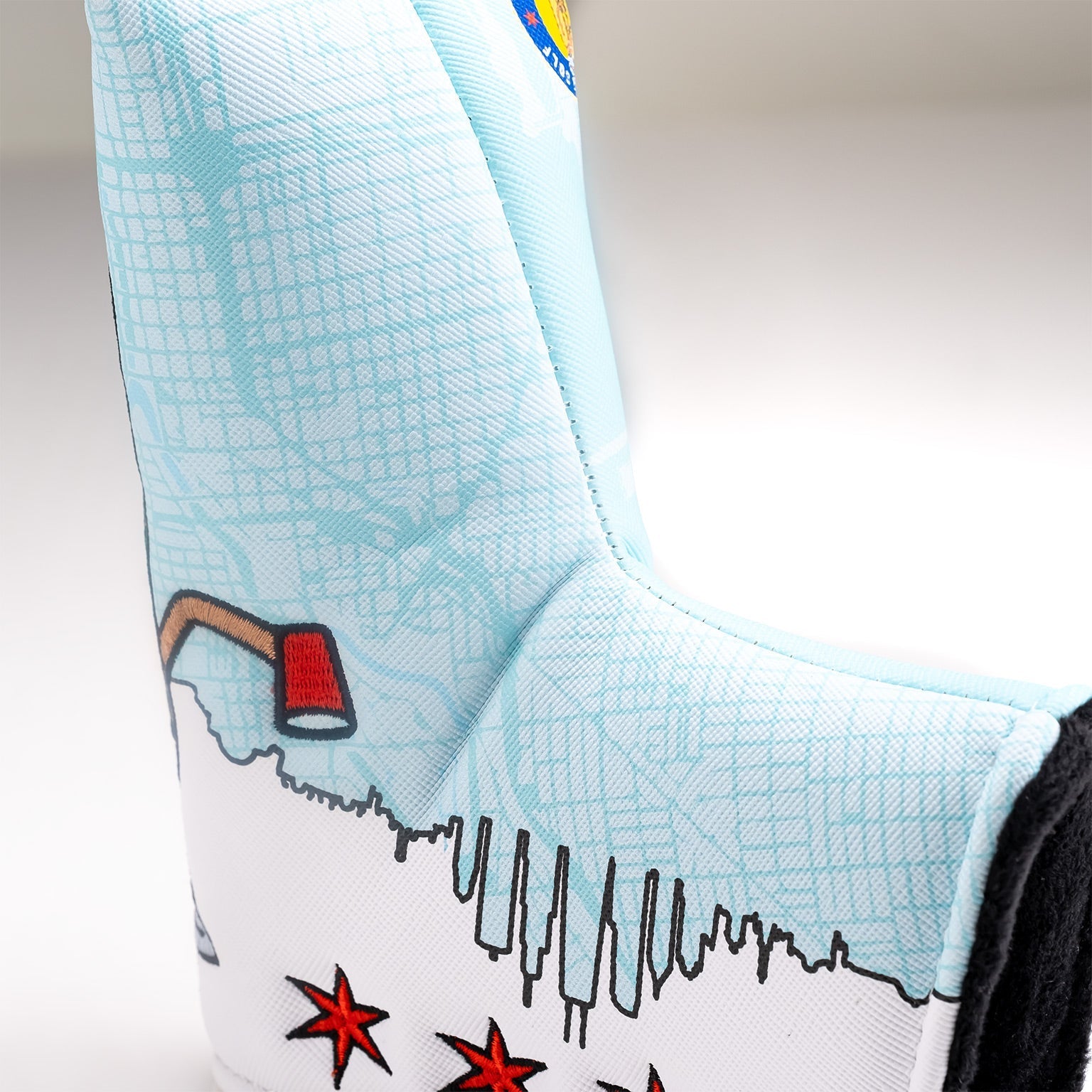 Chicago Dog Blade Putter Cover featuring a skyline design and vibrant colors, perfect for stylish golfers.
