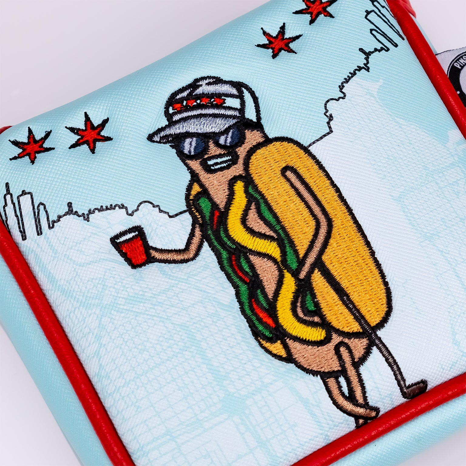 Chicago Dog mallet putter cover featuring a cartoon hot dog character wearing sunglasses and holding a drink.