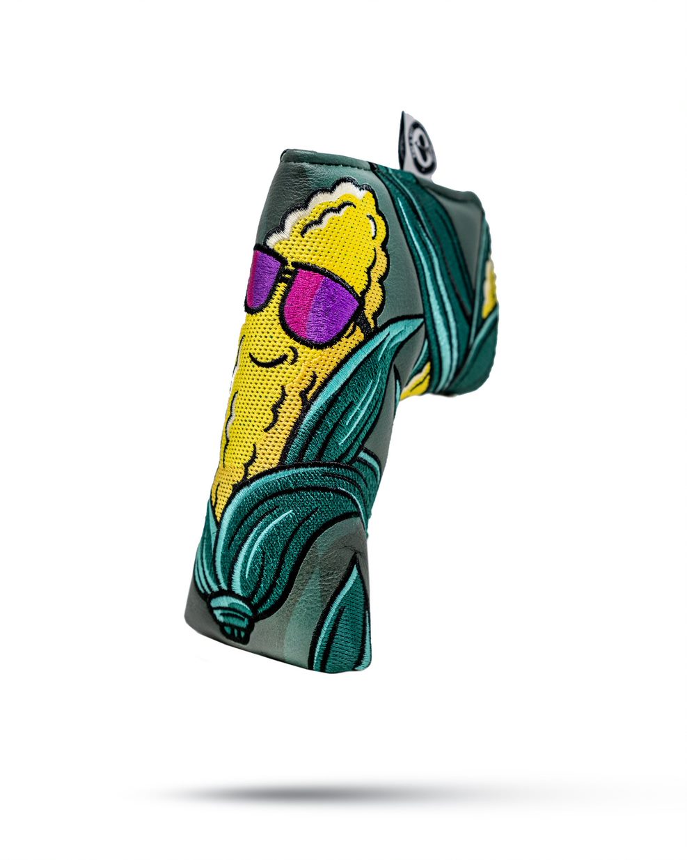 Colorful corn-themed blade putter cover featuring a smiling corn character in sunglasses, designed for bold golfers.