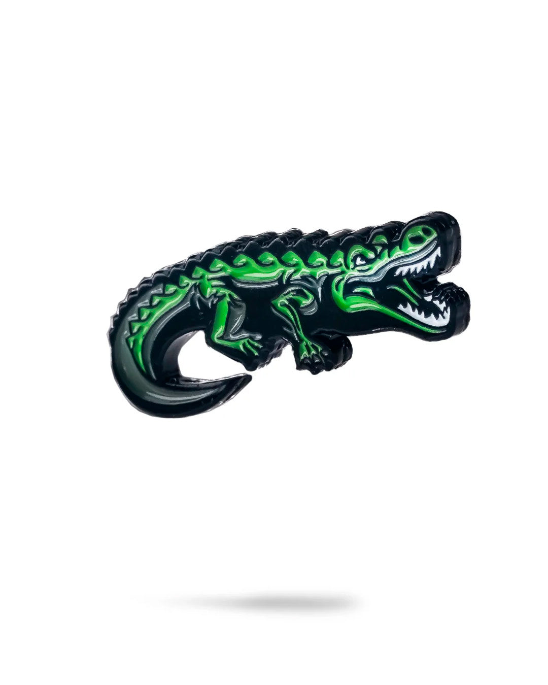 Crocodile-shaped ball marker featuring vibrant green and black colors, perfect for adding style to your golf game.