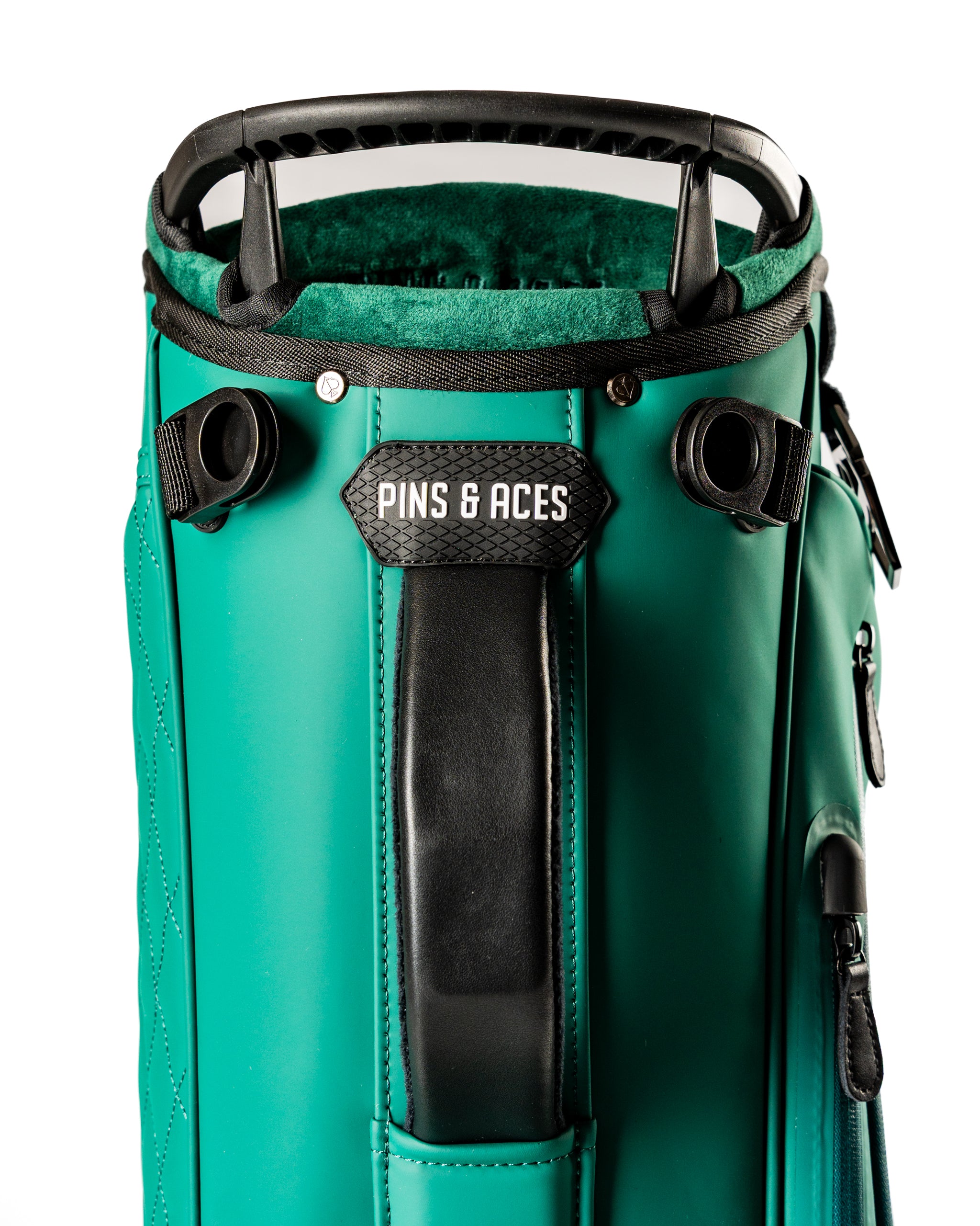 Player Preferred Golf Bag in teal with black accents, featuring a padded top and branded logo for stylish golf outings.