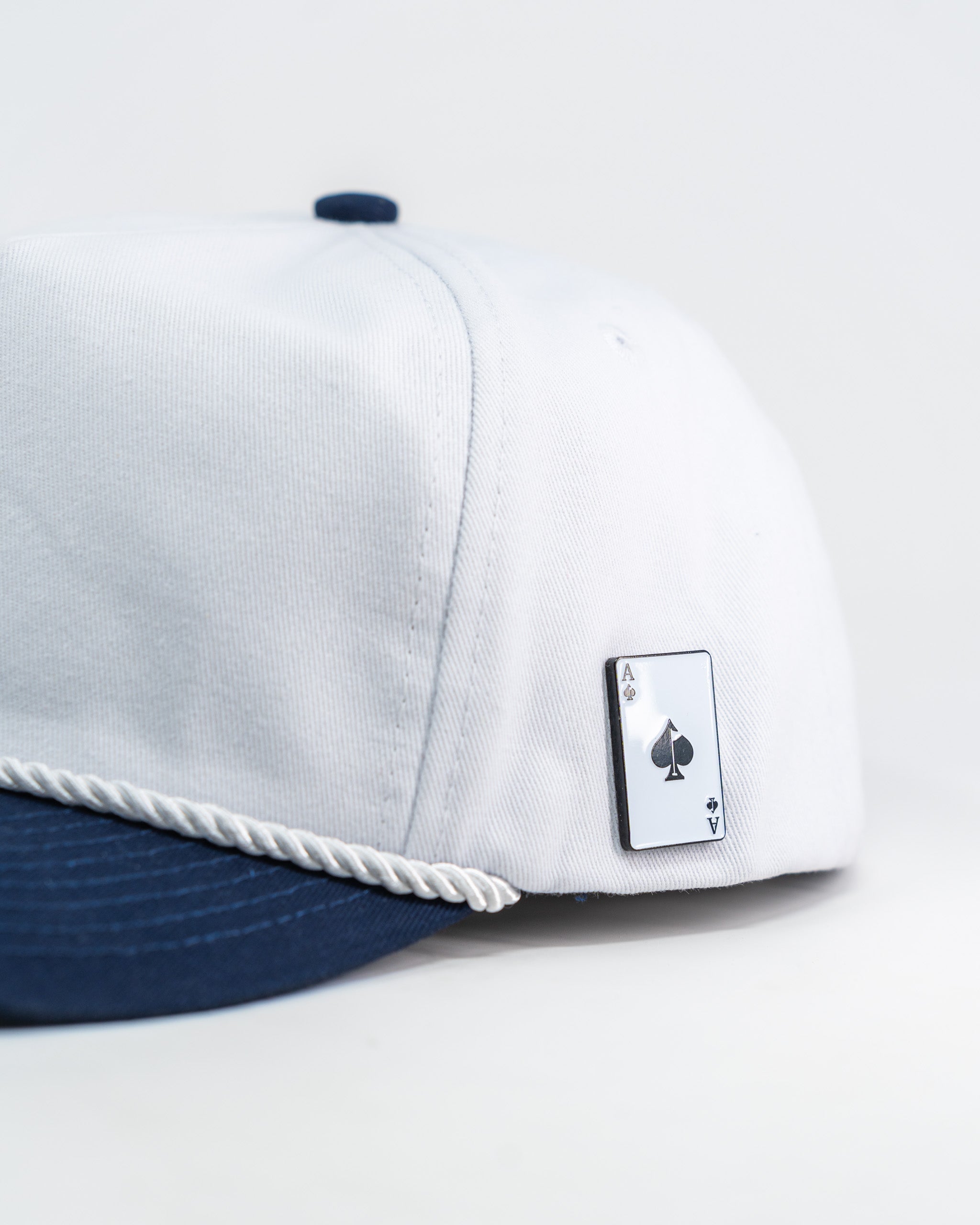 Heritage Rope Hat in Admiral blue, featuring a classic rope detail and adjustable strap.