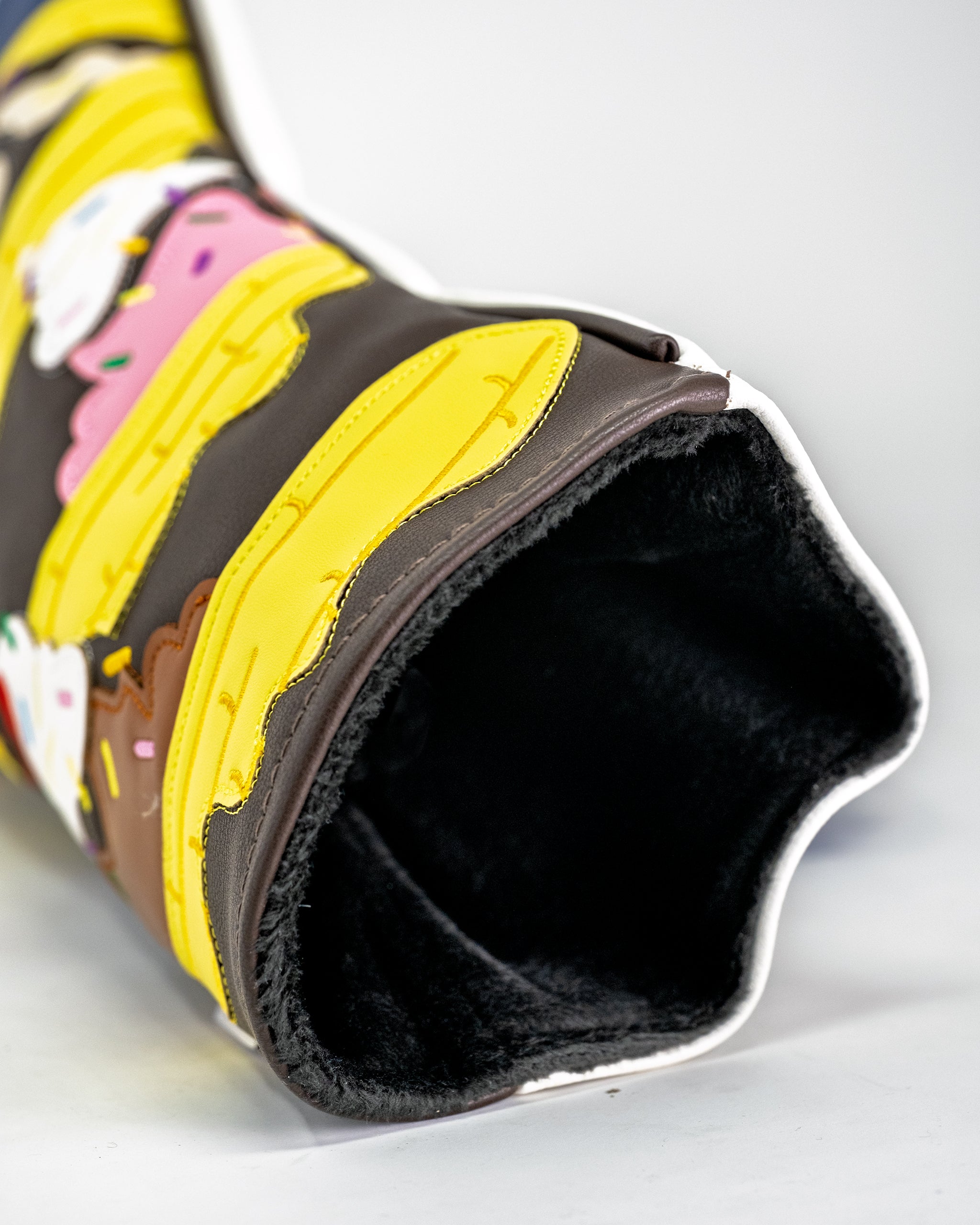 Colorful Banana Split driver cover featuring vibrant banana, ice cream, and cherry designs.