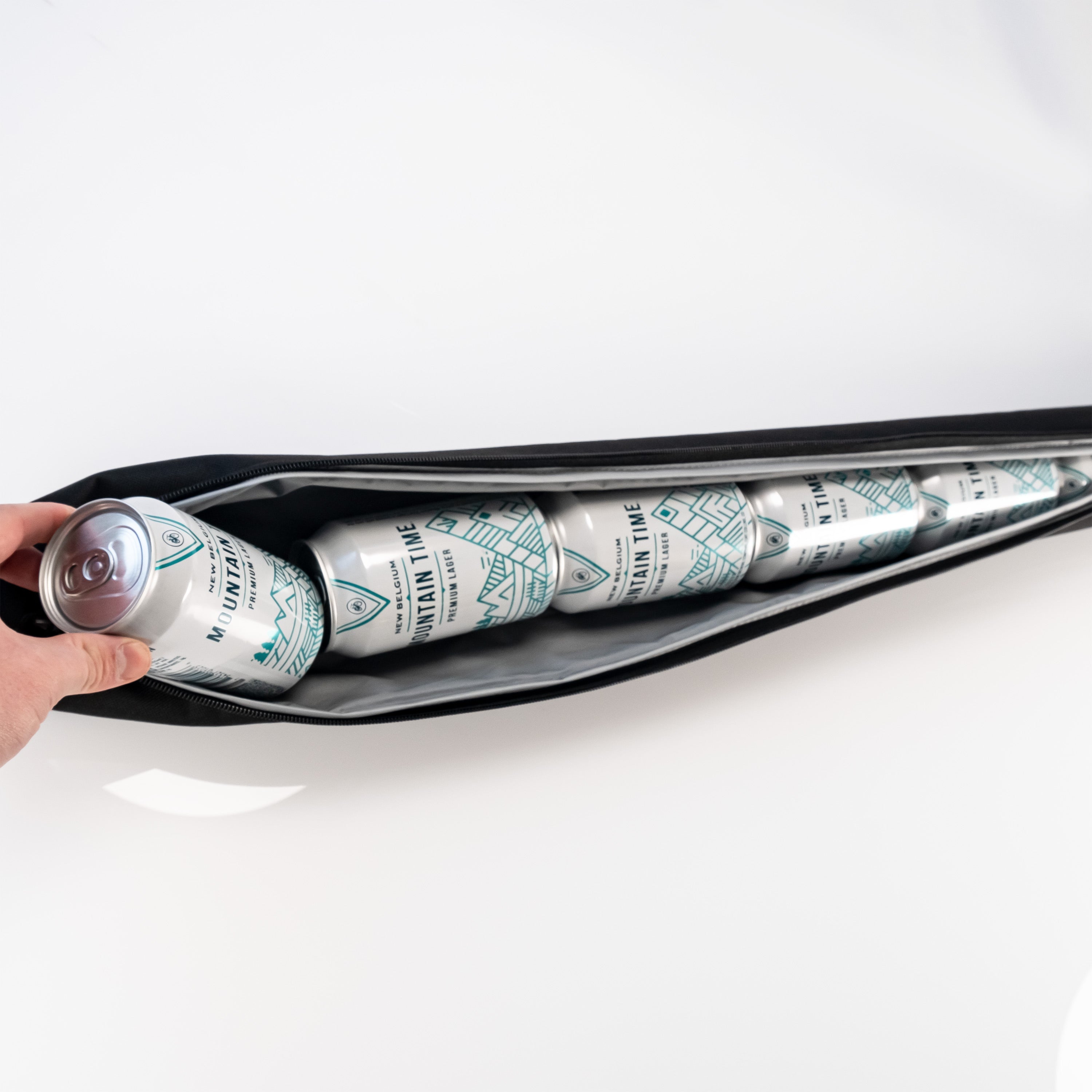 Blue digital camo beer sleeve with a hand inserting a beer can.